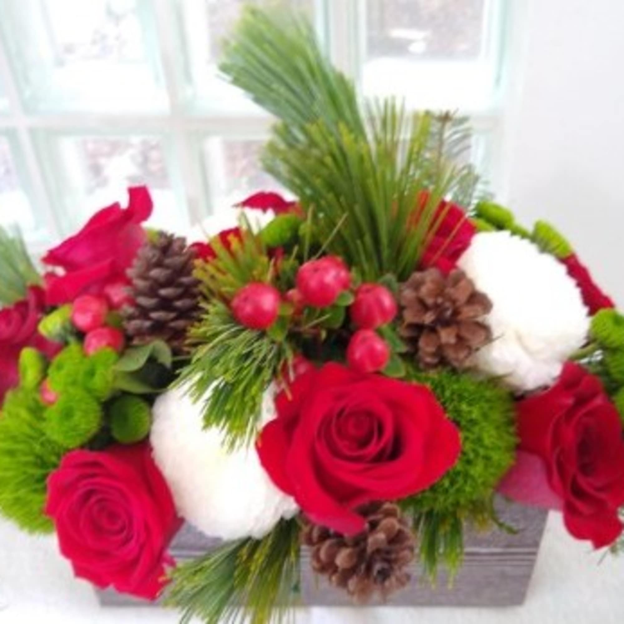 Filled with the essence of warmth and coziness, the Bundled Up Bouquet