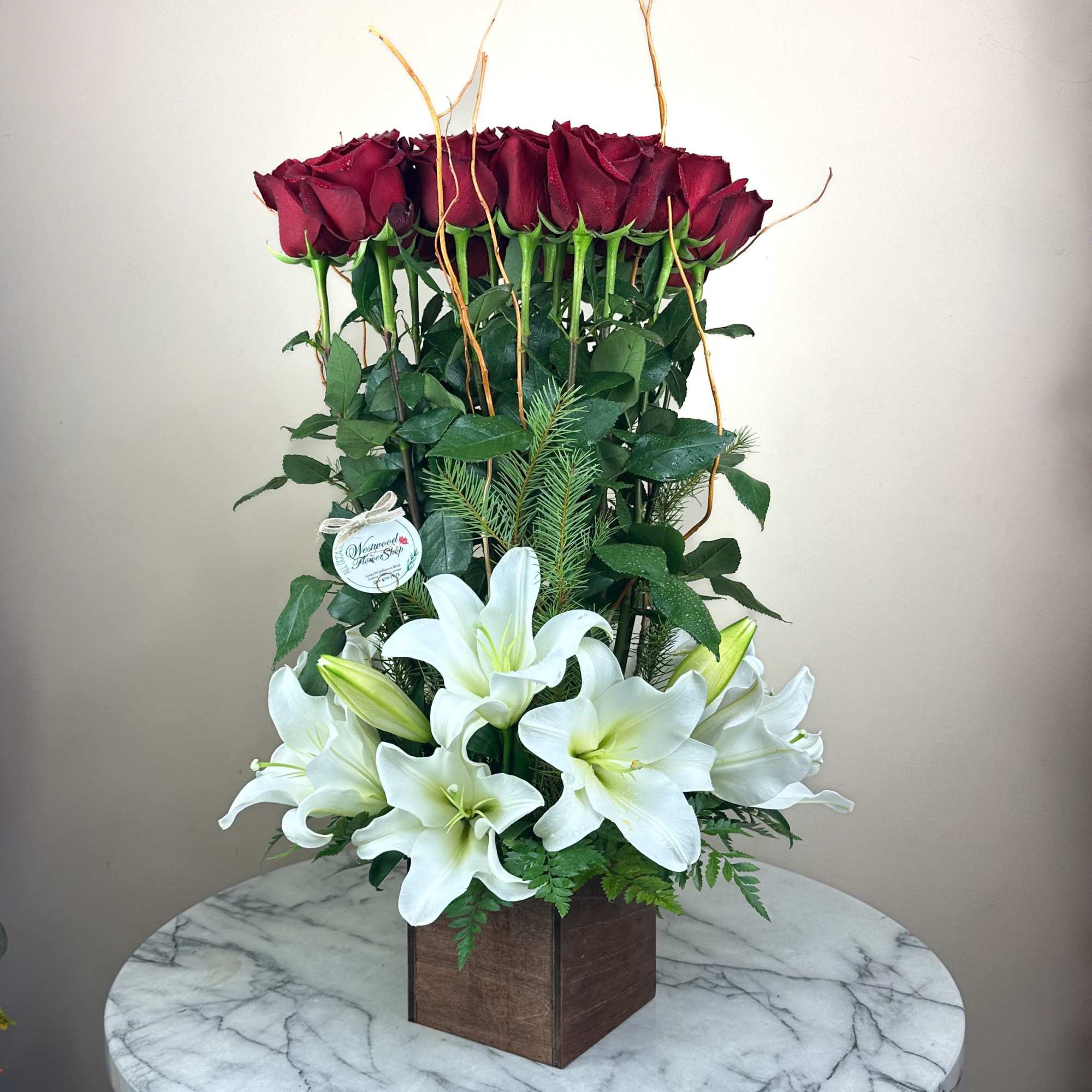 Tall, contemporary and absolutely magnificent! This grand design of premium equadorian roses