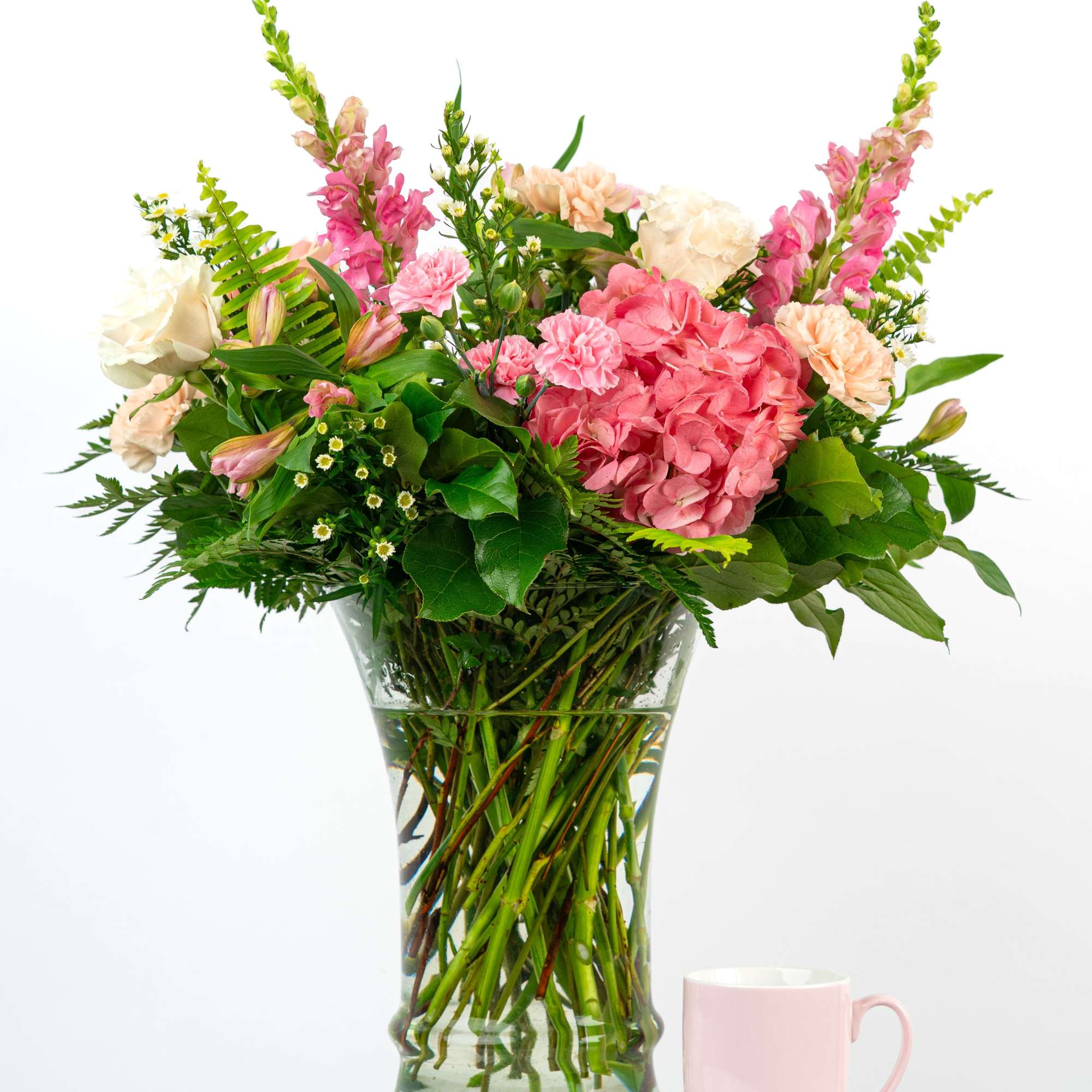 Our Timeless Collection's Blush Blooms features elegant blooms in soft blush hues