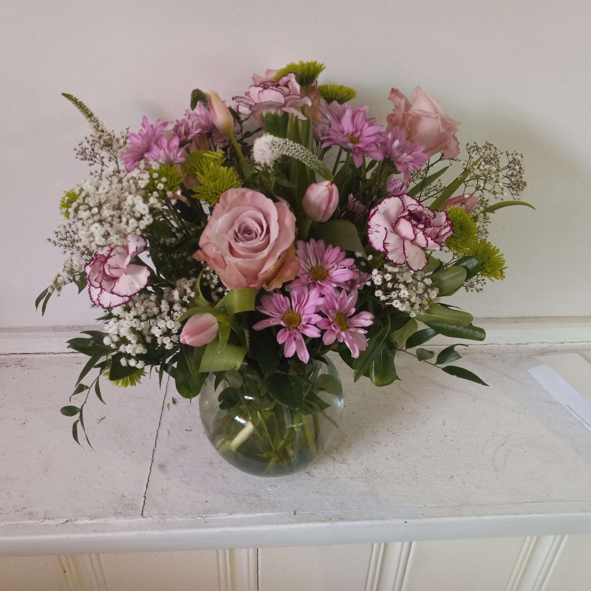 Beautiful light purple tones daisies, carnations, roses, tulips and baby&#039;s breath with