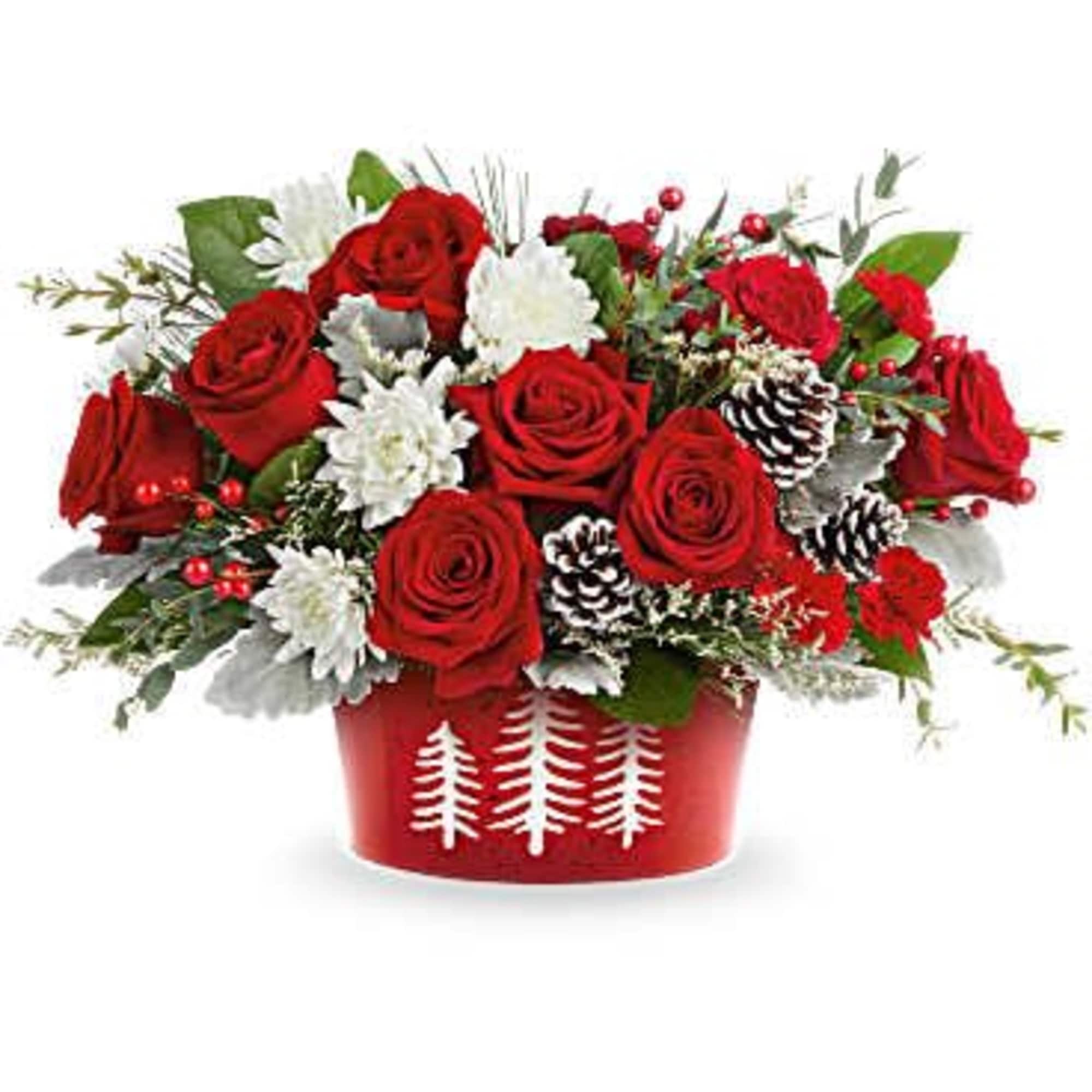 Snowy Pines Centerpiece captures the beauty of the holidays with red roses