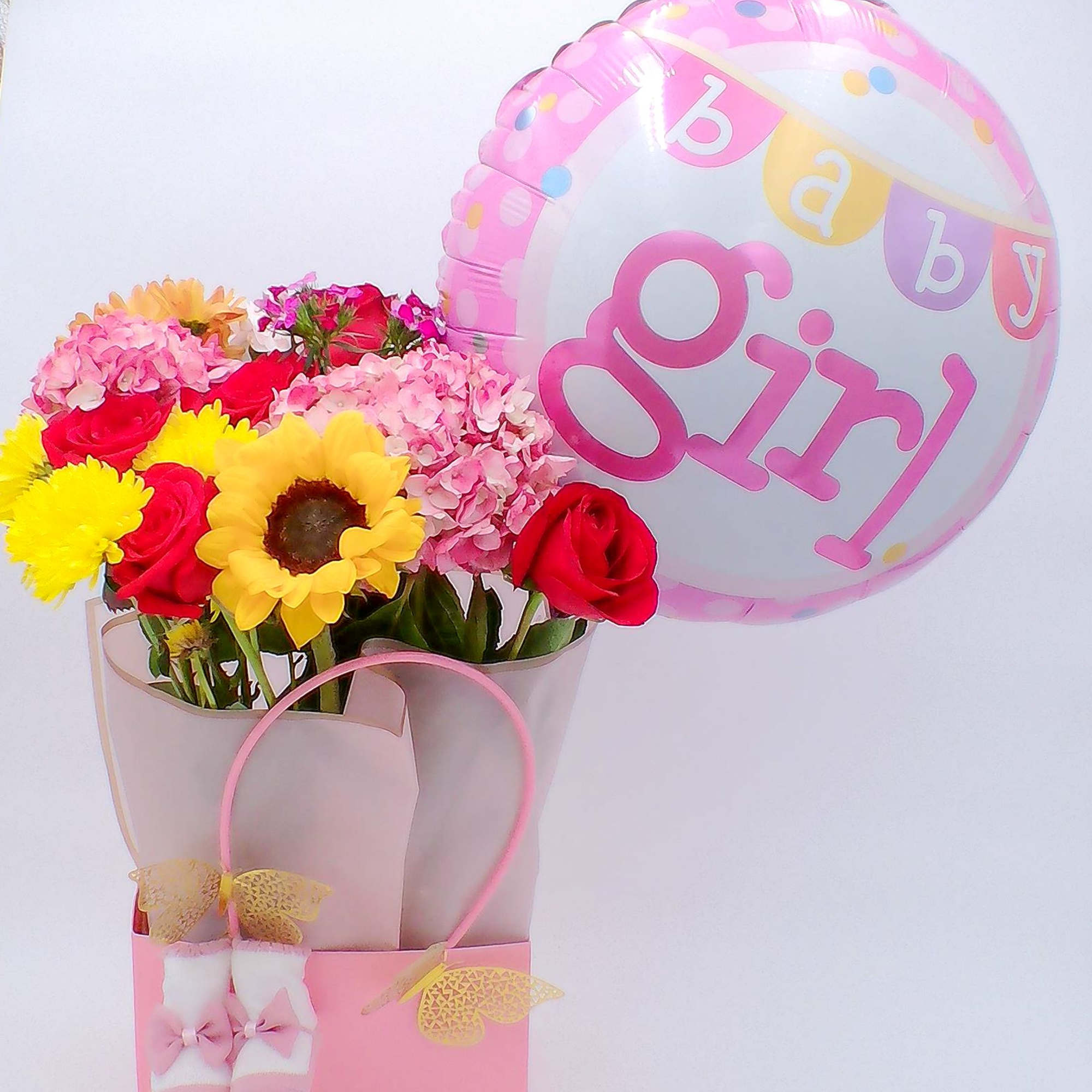 Mixed Fresh Flowers (14&ndash;16 stems): a colorful blend of 4 roses, 4