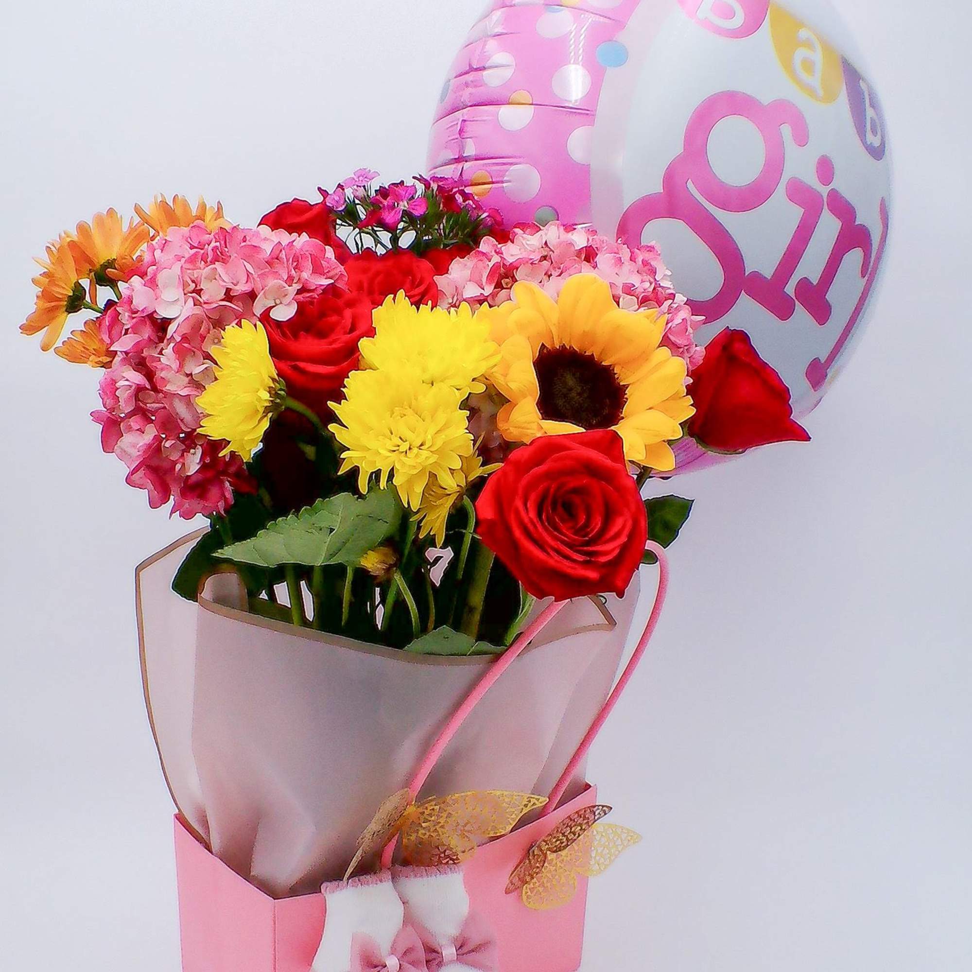 Mixed Fresh Flowers (14&ndash;16 stems): a colorful blend of 4 roses, 4