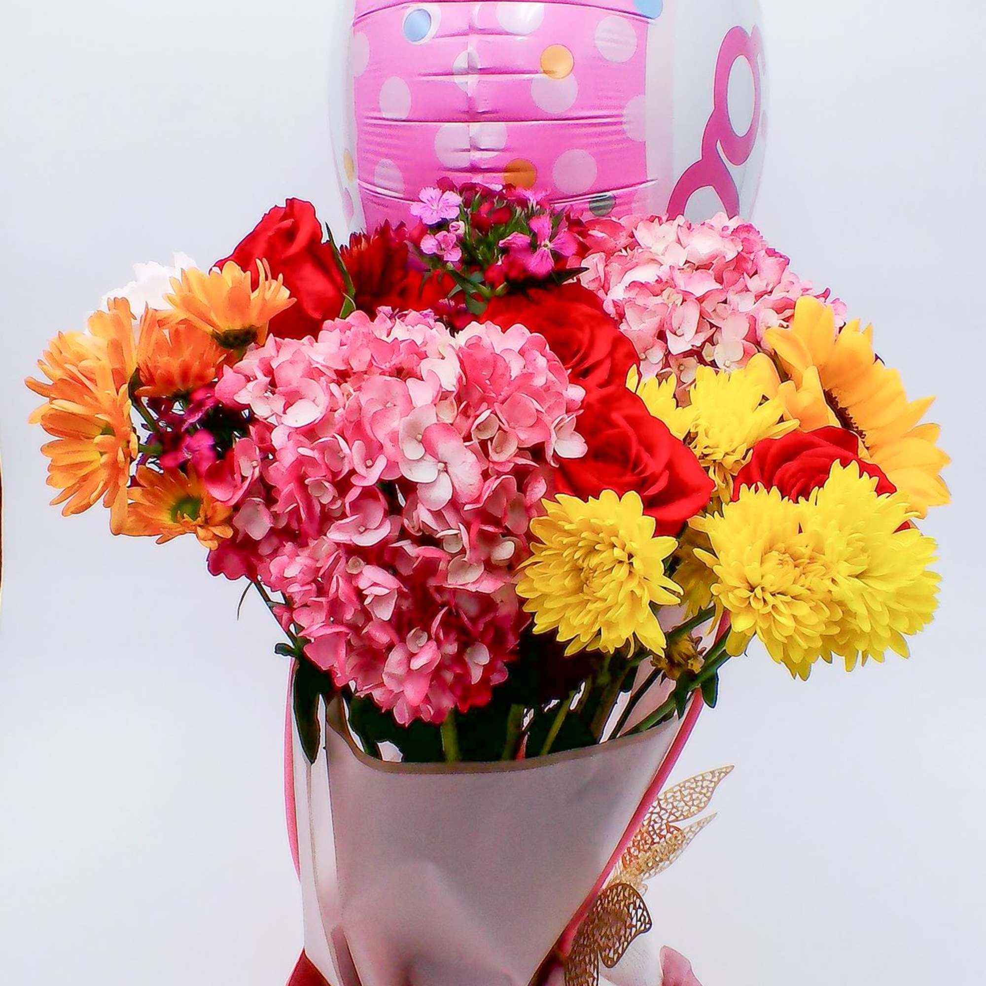 Mixed Fresh Flowers (14&ndash;16 stems): a colorful blend of 4 roses, 4