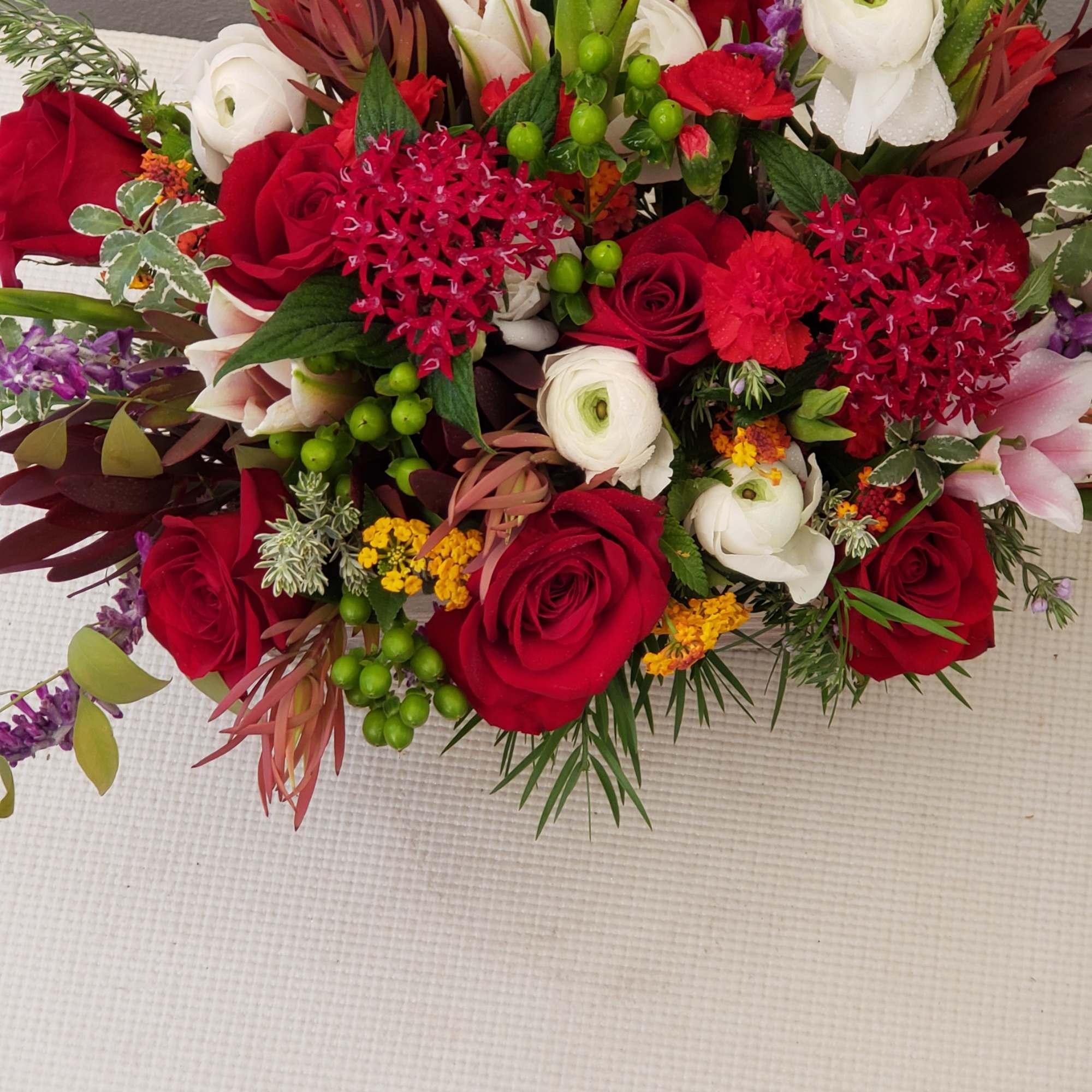 This gift is in a seasonal variety of fresh flowers, bright colors