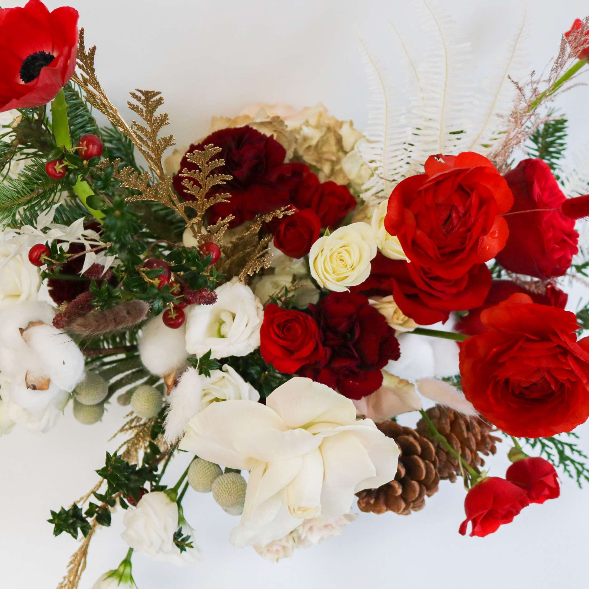 A luxurious holiday centerpiece designed to bring warmth, elegance, and festive charm