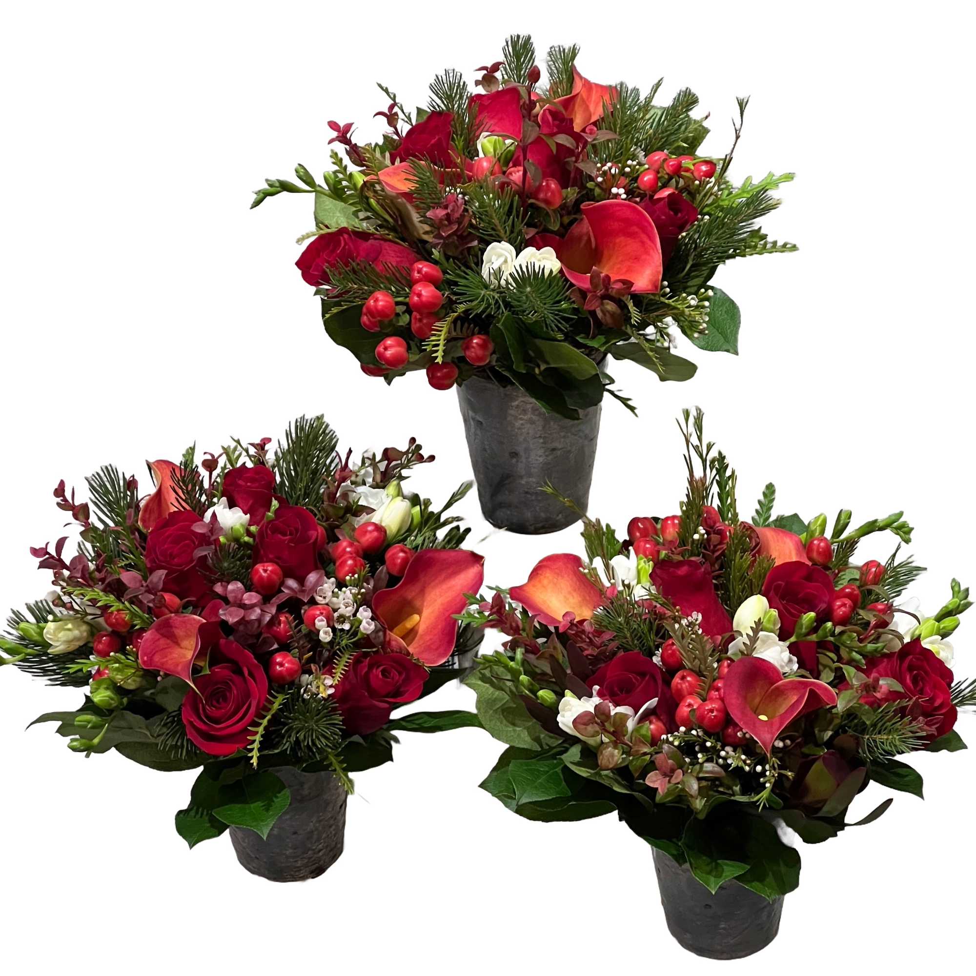 This Christmas centerpiece is a charming trio of festive elegance, consisting of