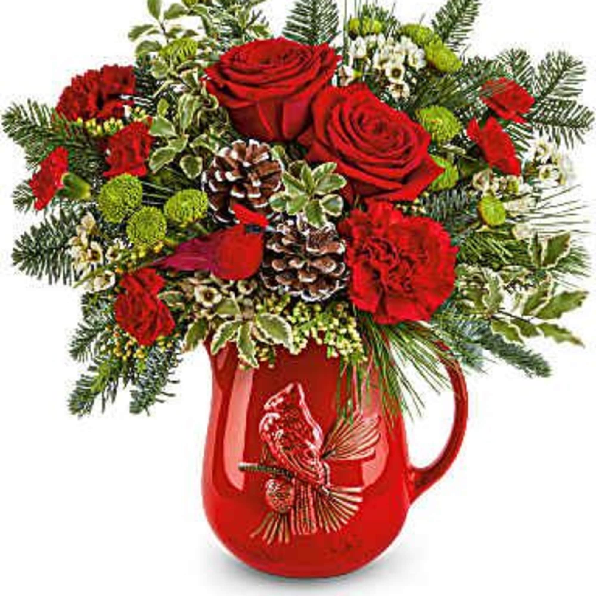 Teleflora&#039;s Festive Flight Bouquet spreads holiday cheer with red blooms, winter greens