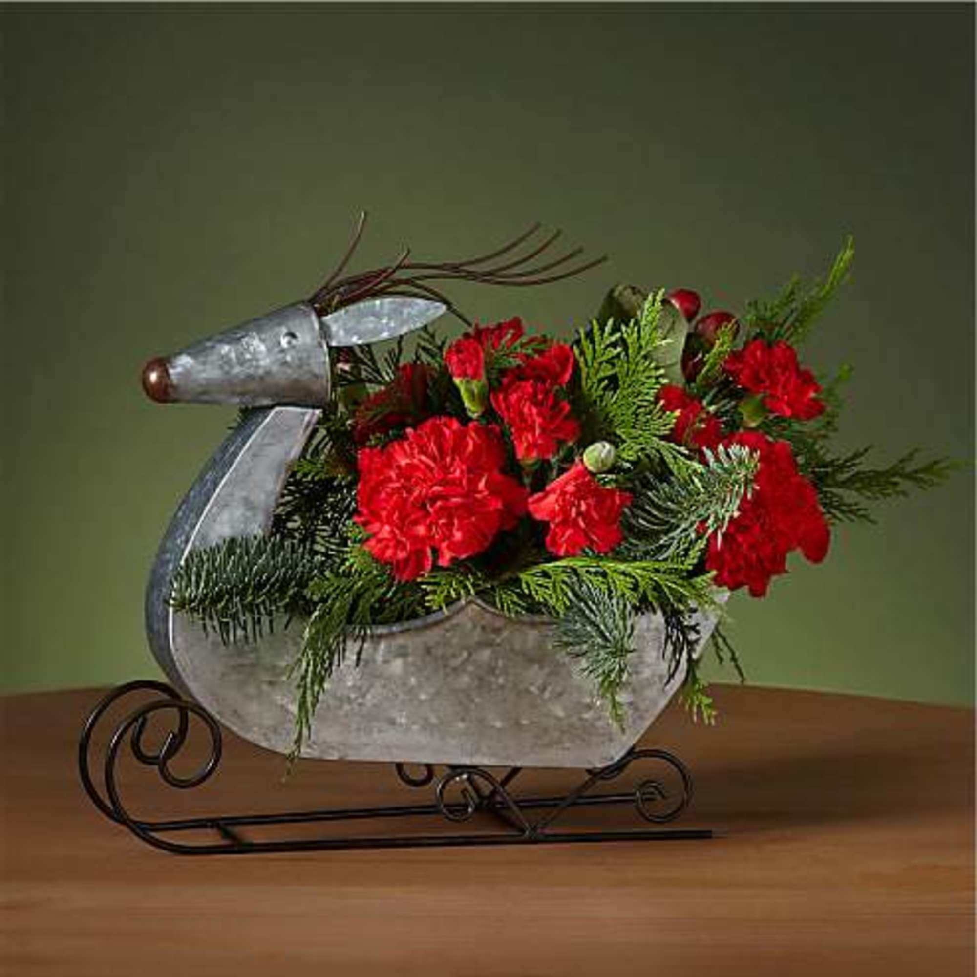 Fly into Christmas Eve with this dashing Prancer Bouquet designed in a
