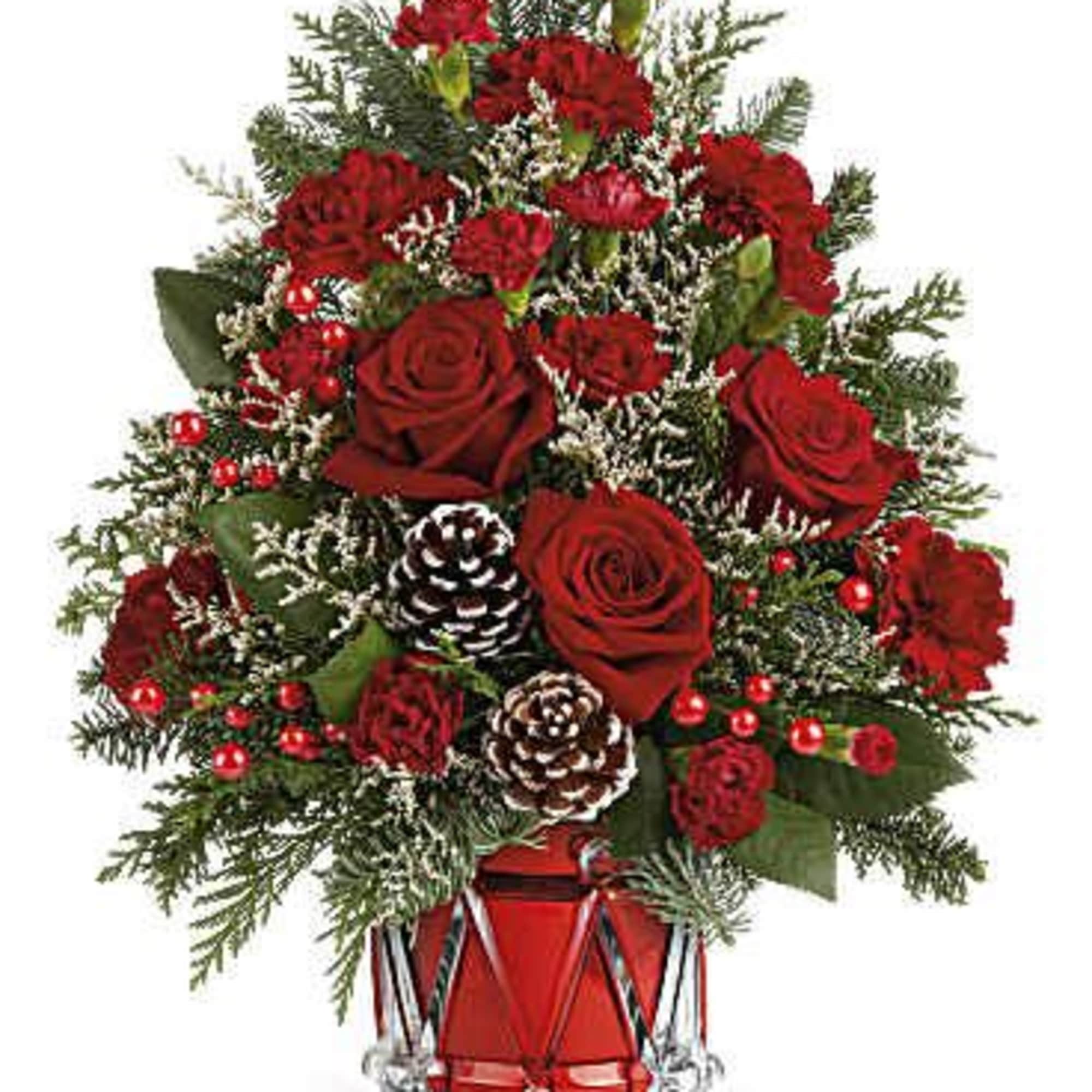 Teleflora&#039;s Yuletide Sparkle Tree is a festive floral Christmas tree made of