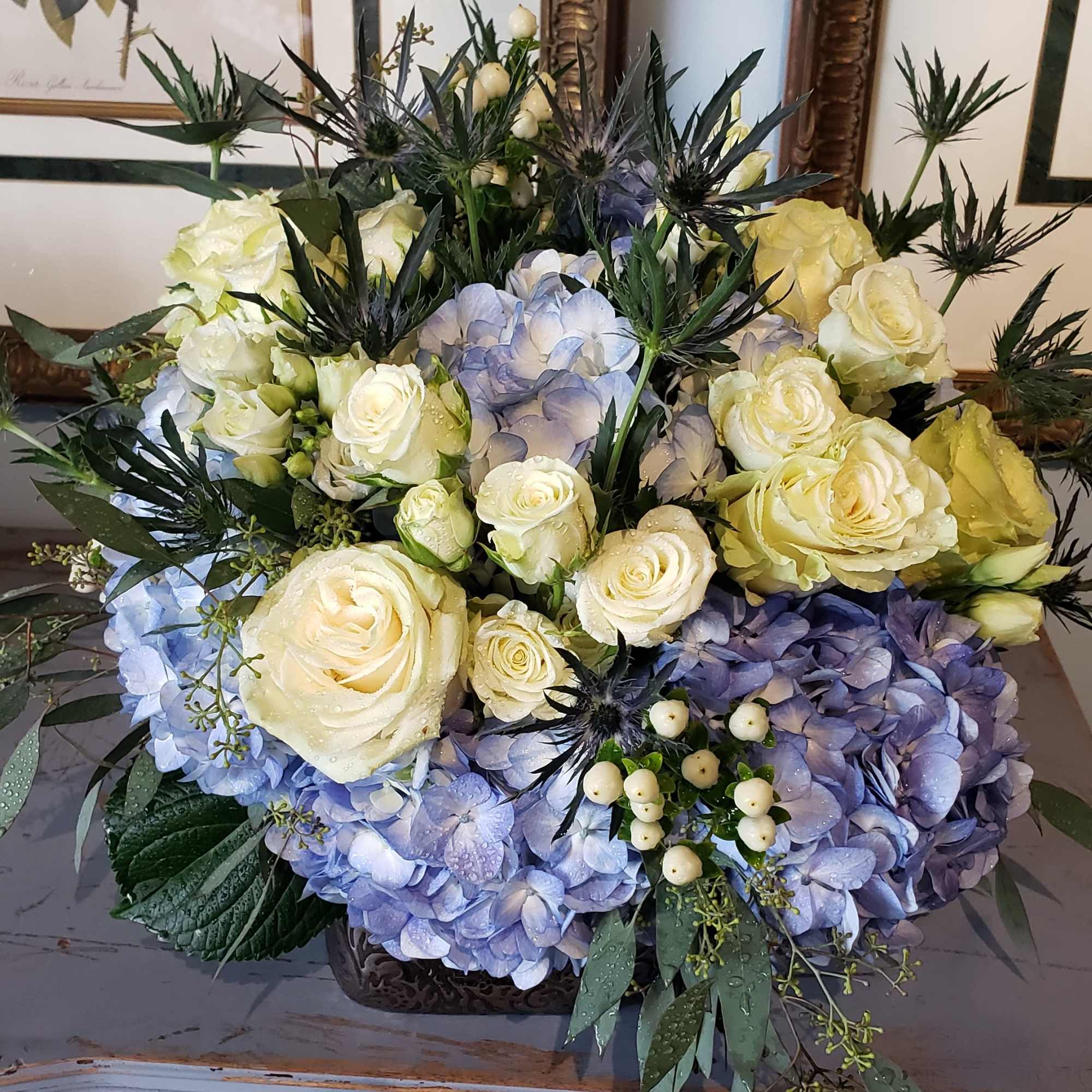  Elegant copper cube, filled with perry winkle blue hydrangea blooms,white roses