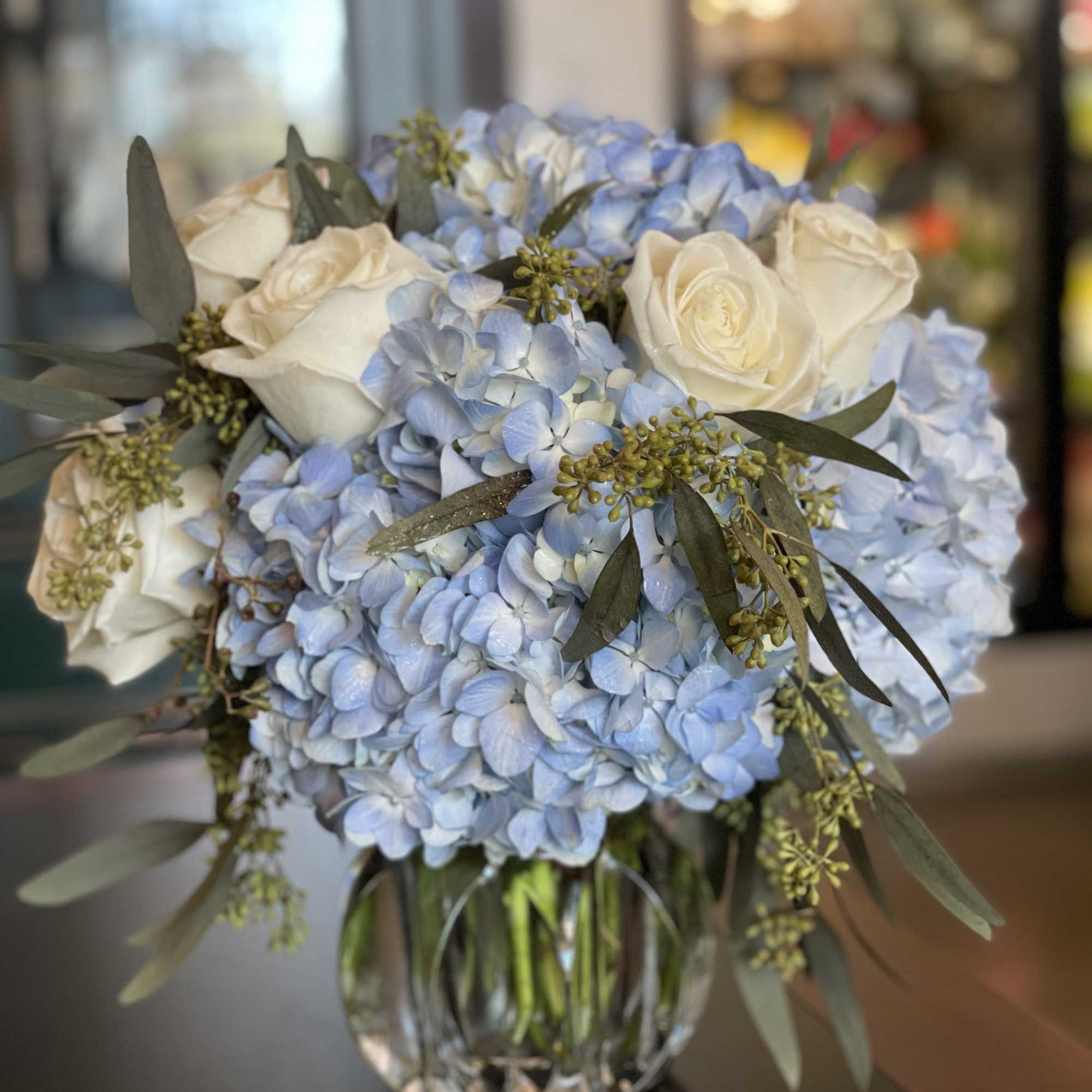 True Blue is a captivating arrangement that combines elegance with a pop