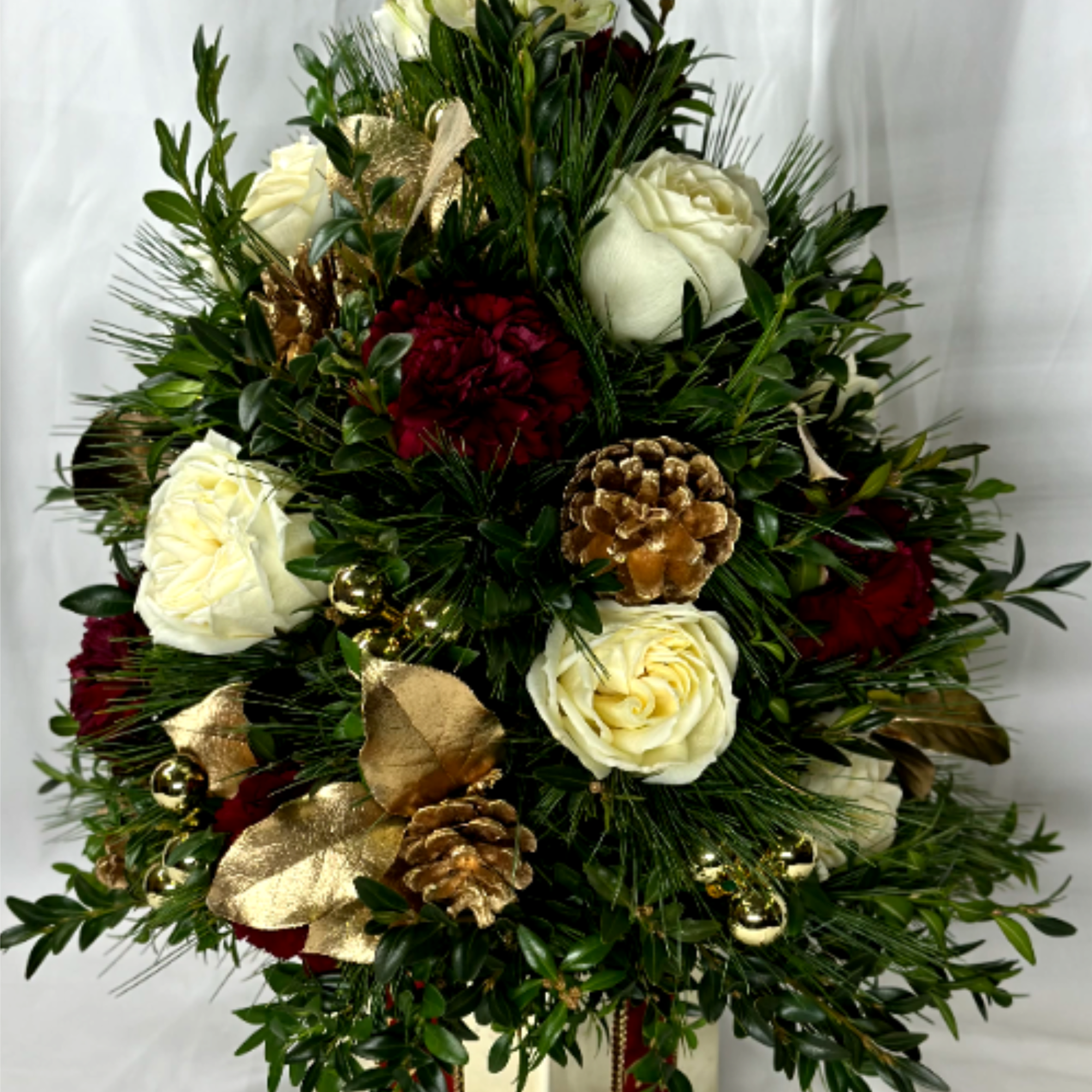 This is a beautiful rendition of a Christmas tree using real boxwood