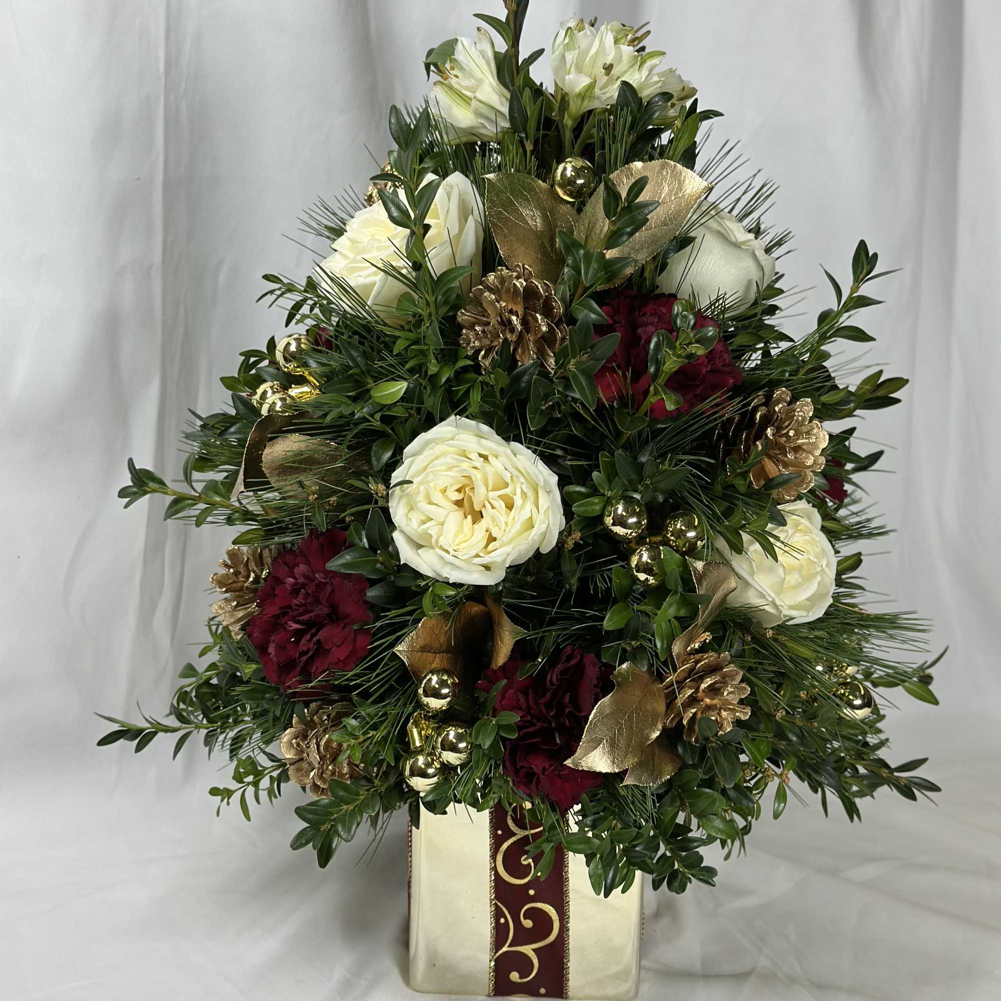 This is a beautiful rendition of a Christmas tree using real boxwood