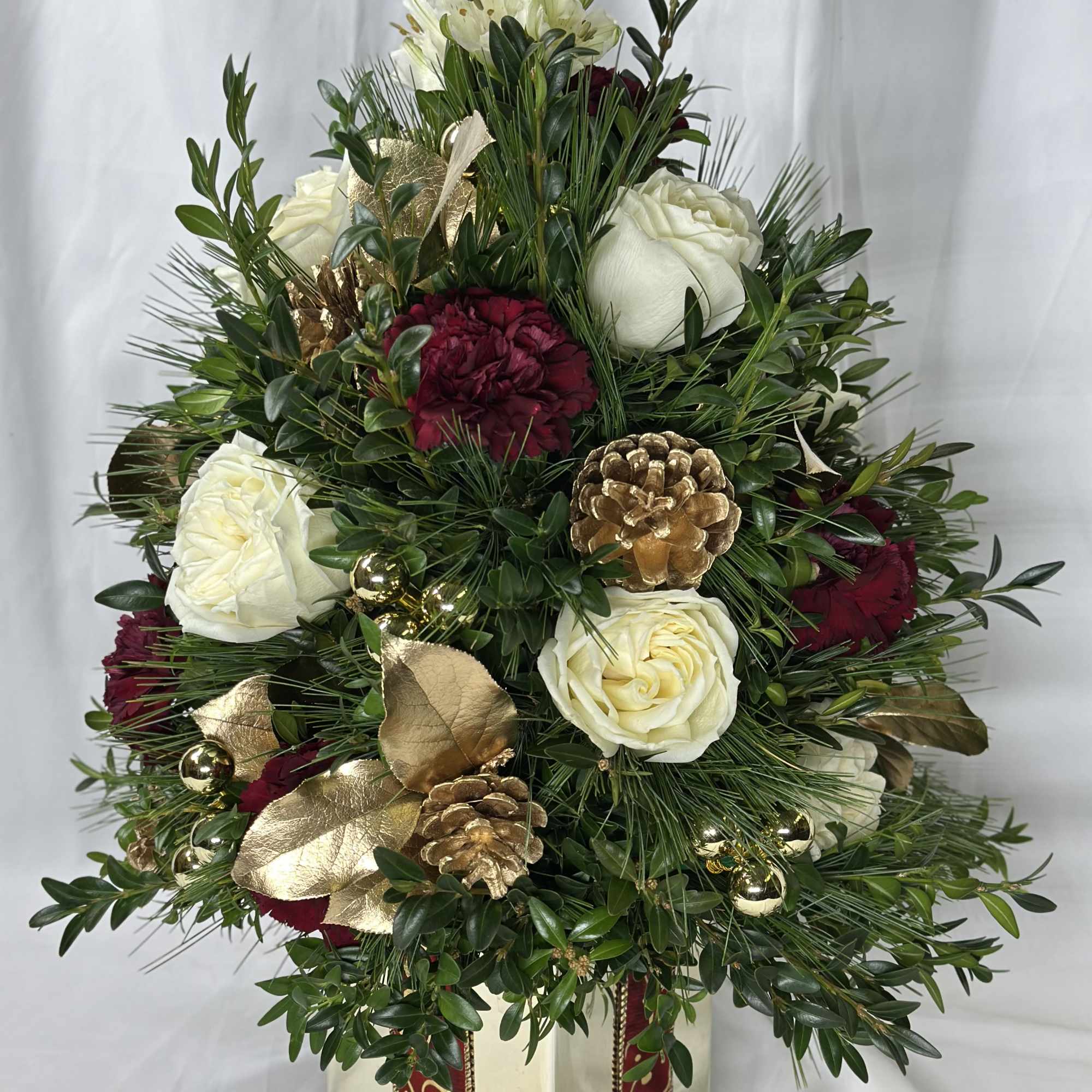 This is a beautiful rendition of a Christmas tree using real boxwood