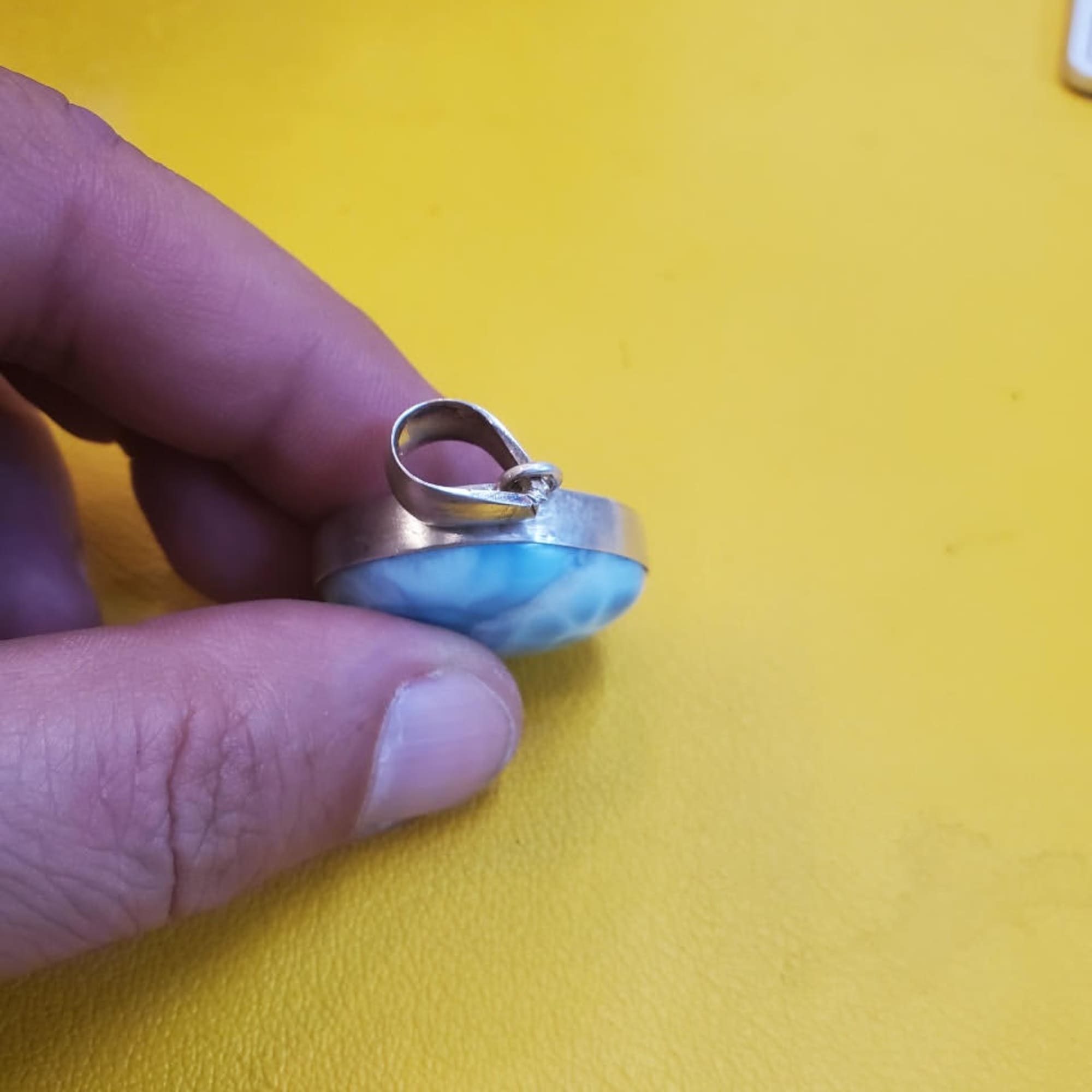 Adorn yourself with the mesmerizing beauty of Larimar with our 20.3 Ct.