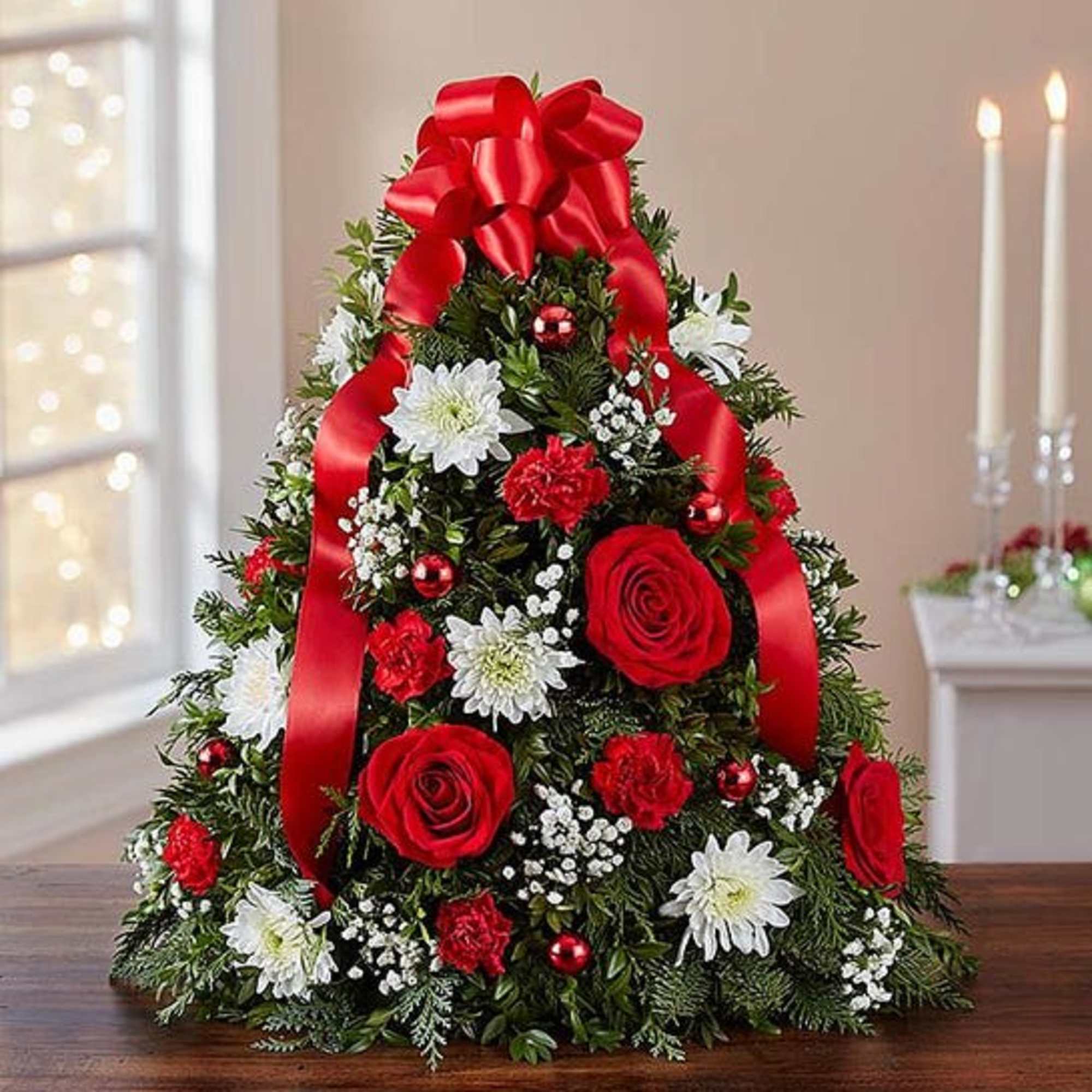 The holiday favorite that started it all! Our flower tree arrangement is