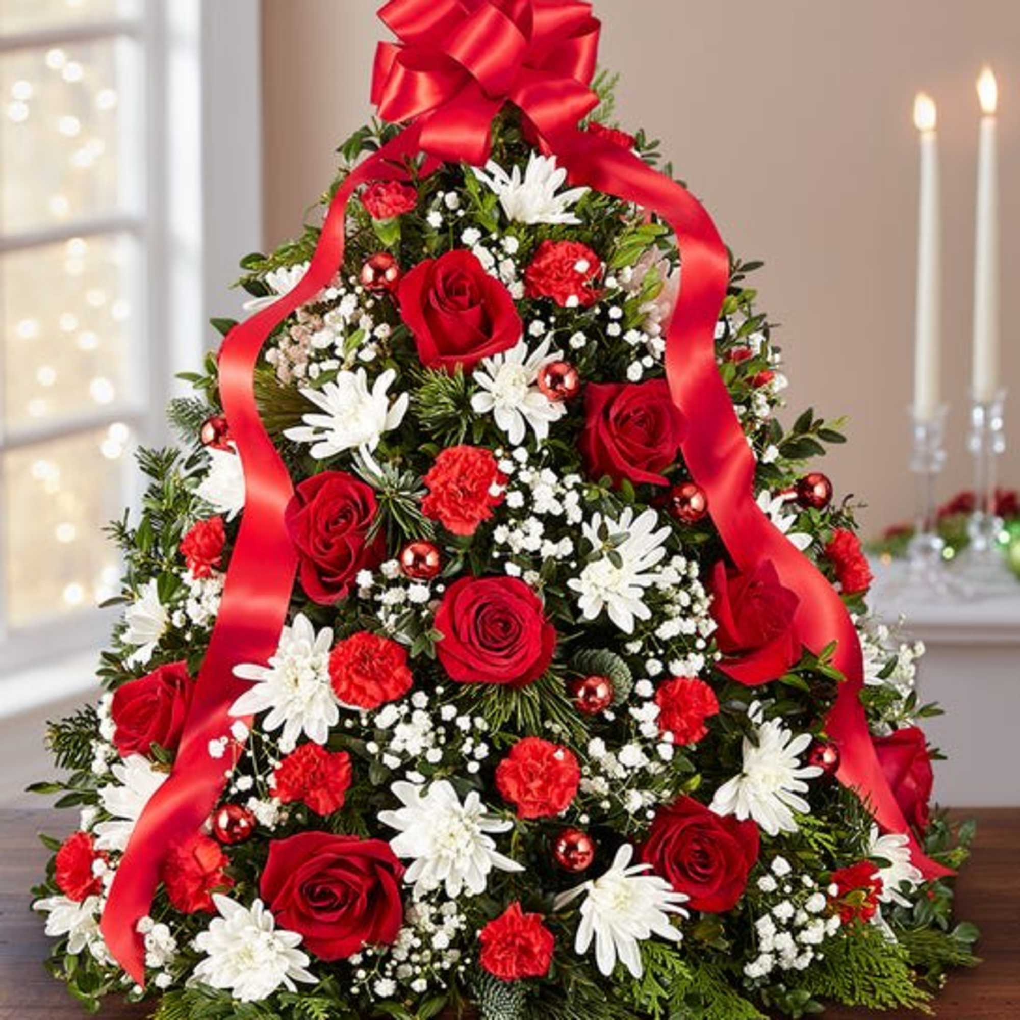The holiday favorite that started it all! Our flower tree arrangement is