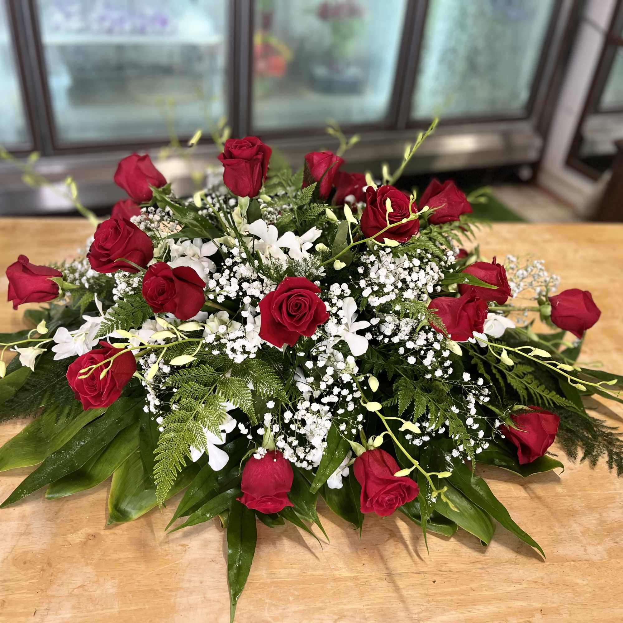 Red roses + white sonia orchids &amp; babies breath 