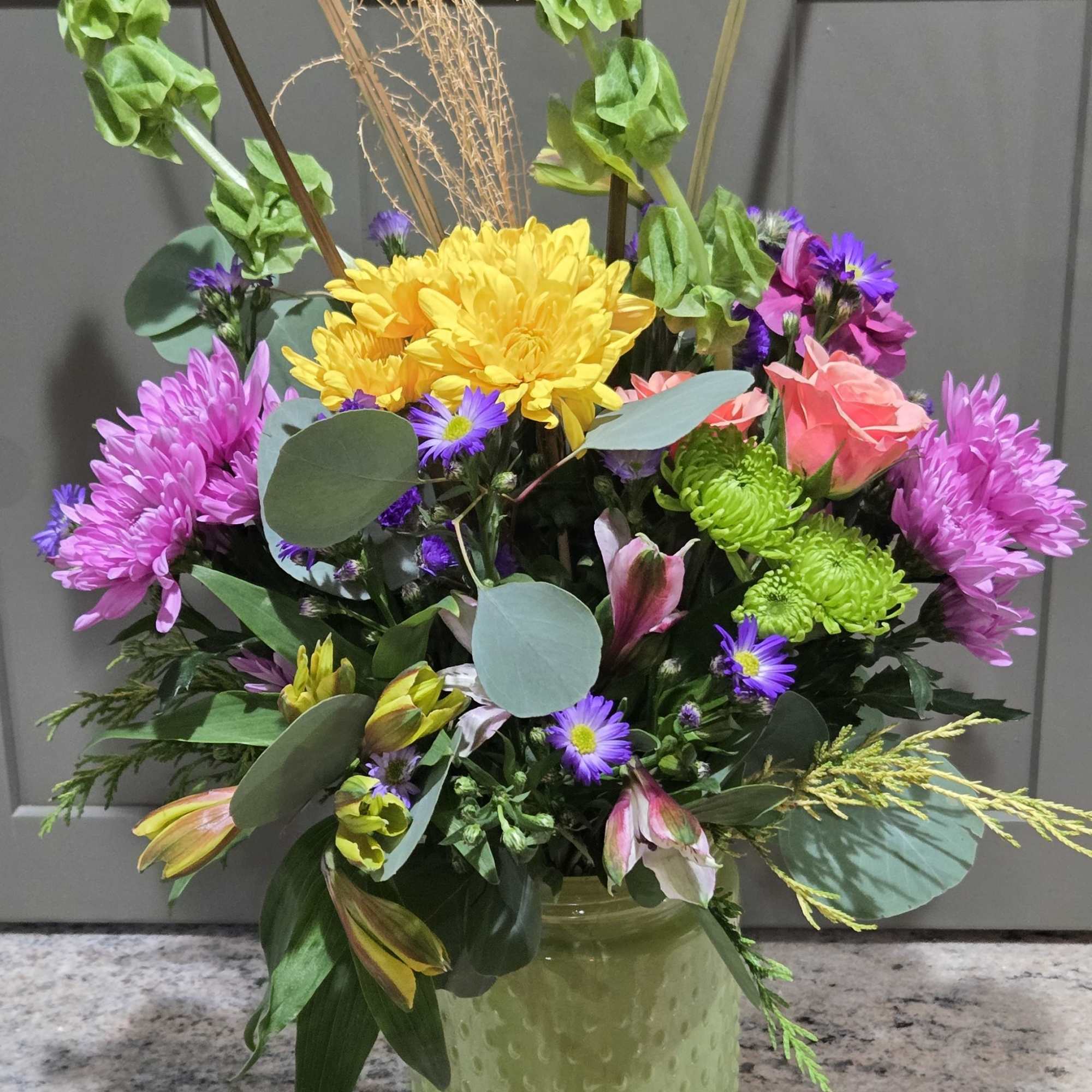 Cheerful design for any occasion or decor. Glass colored polkadot jug style.