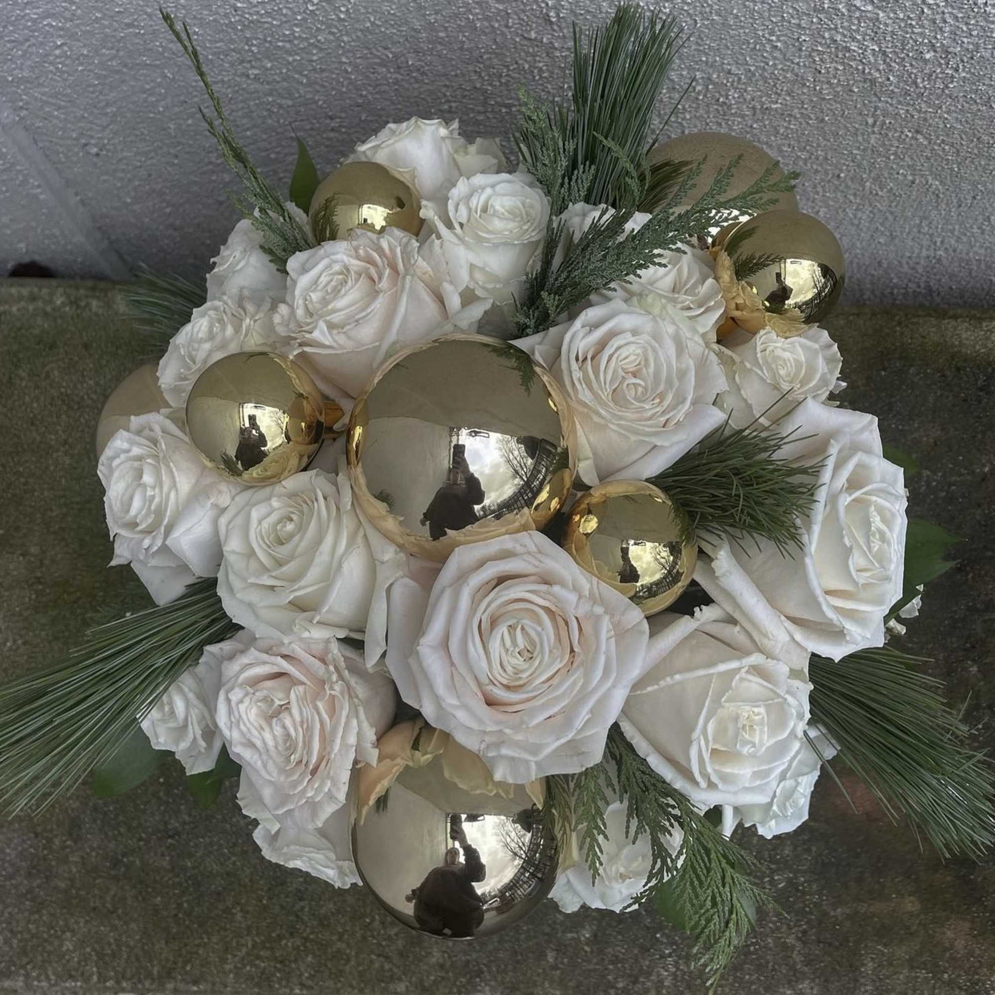 A gorgeous upscale rose bowl arrangement, Let It Snow features White Roses