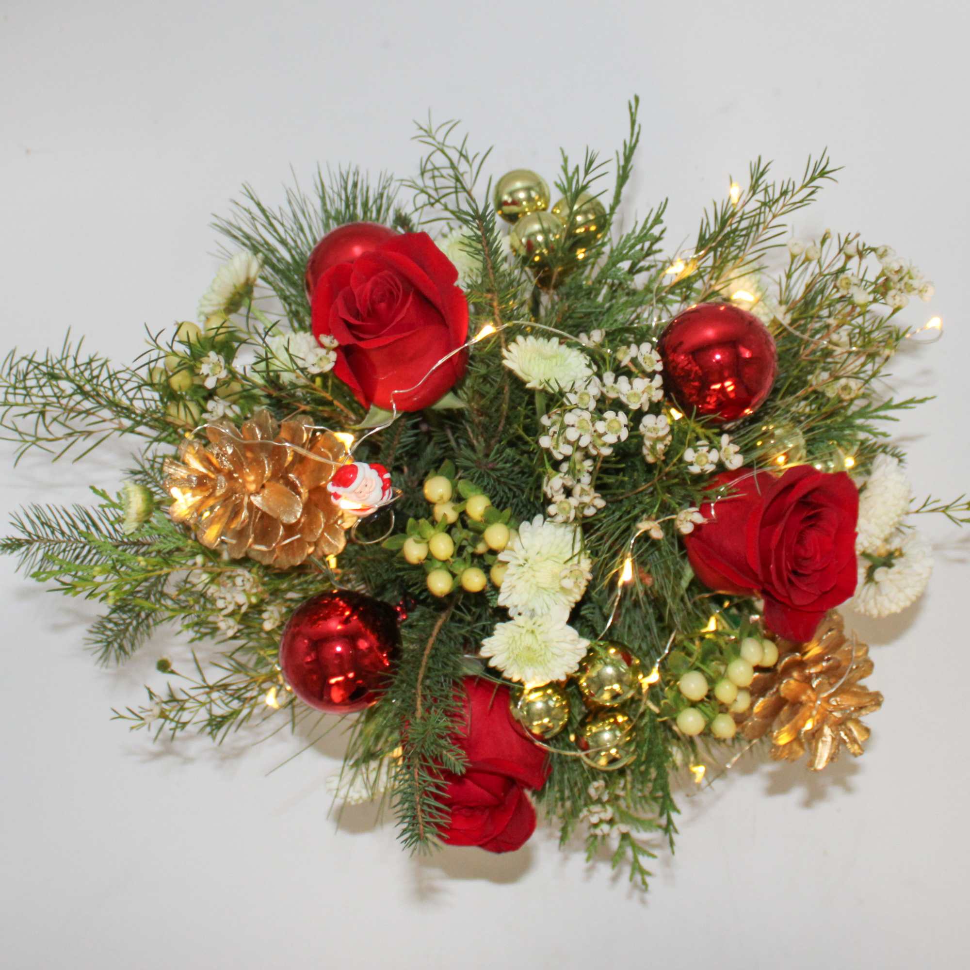 Santa&rsquo;s Sleigh is fun for the family, this arrangement lights up and