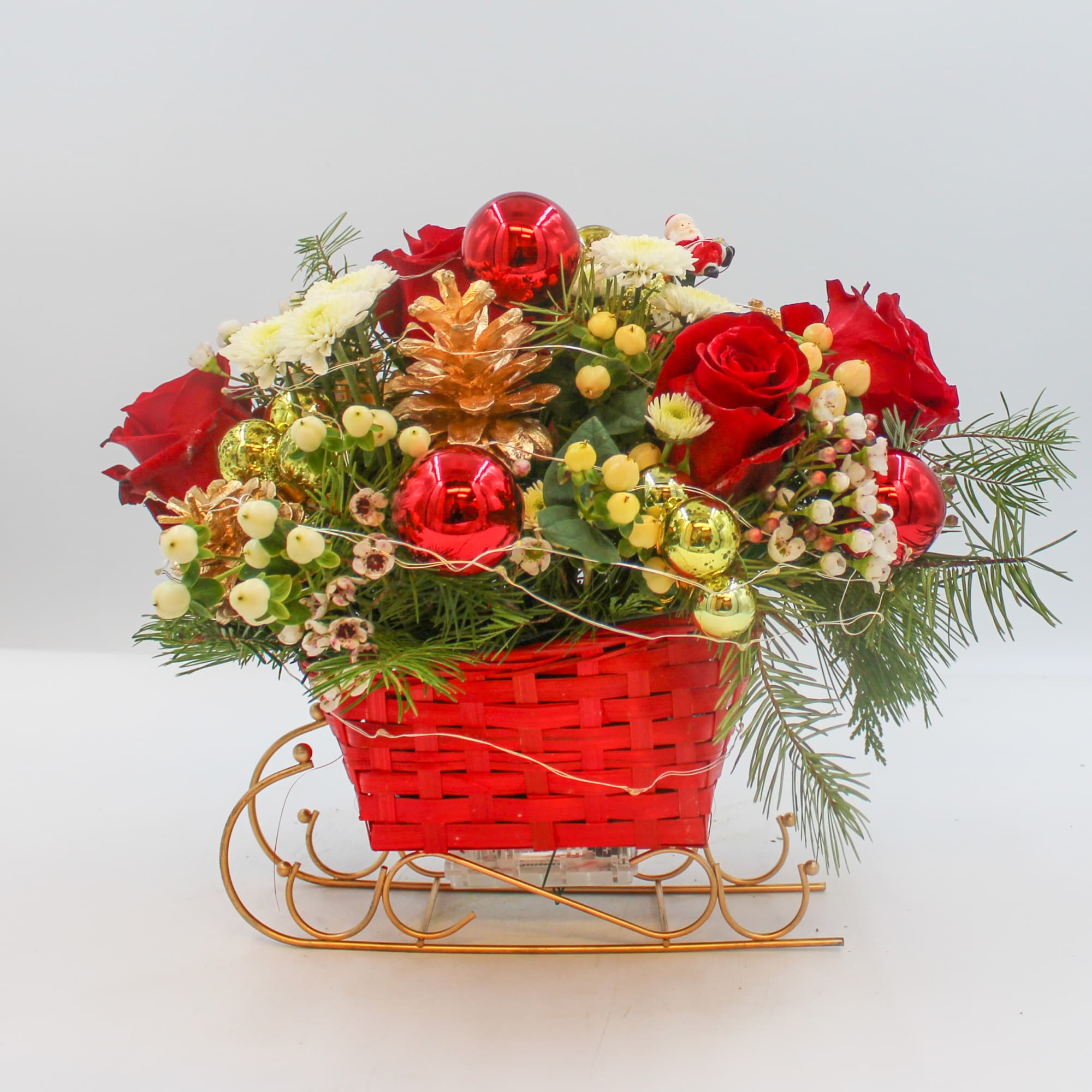 Santa&rsquo;s Sleigh is fun for the family, this arrangement lights up and