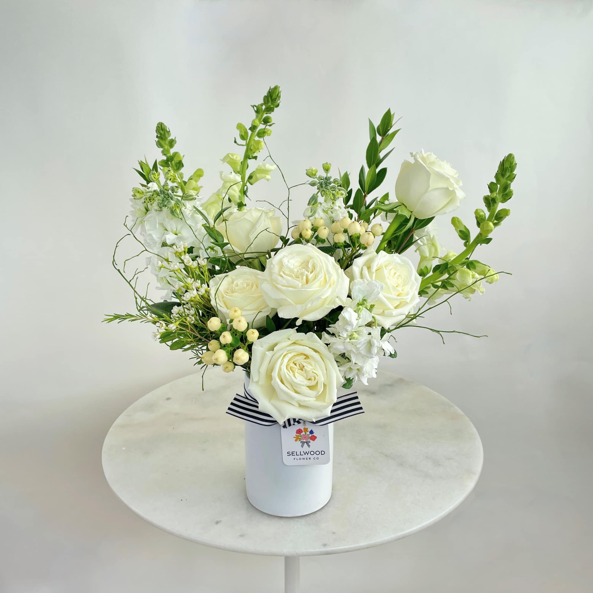 A stunning white bouquet that evokes simplicity, calmness, and peace. This arrangement