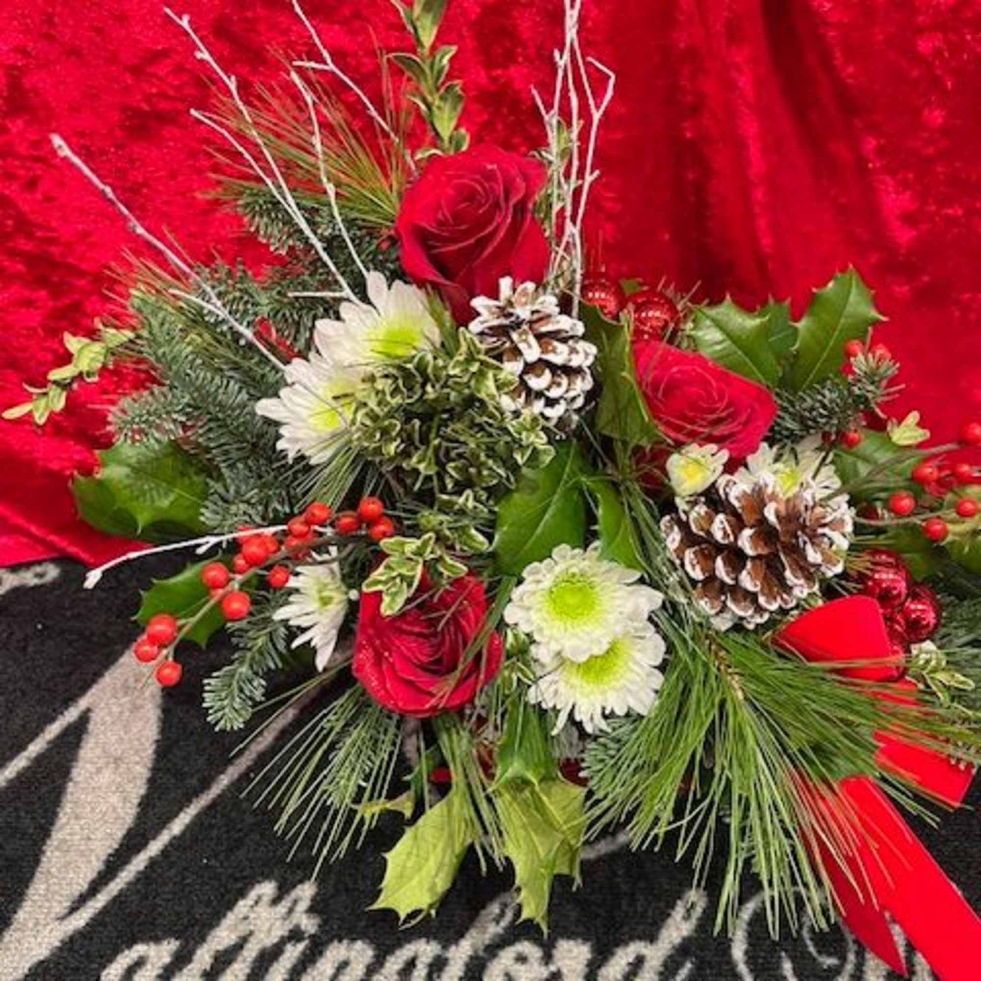 Sleigh Bells is designed in a charming white sleigh filled with winter