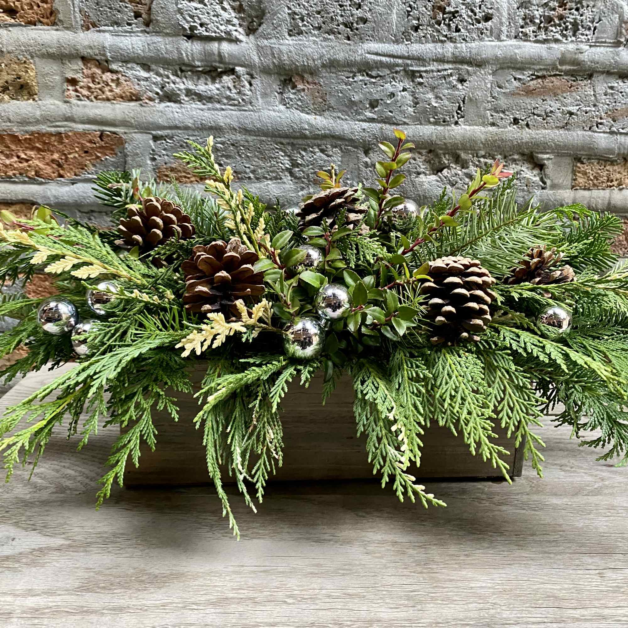 Variety of Evergreens, pinecones and holiday accents - NO FLOWERS 
