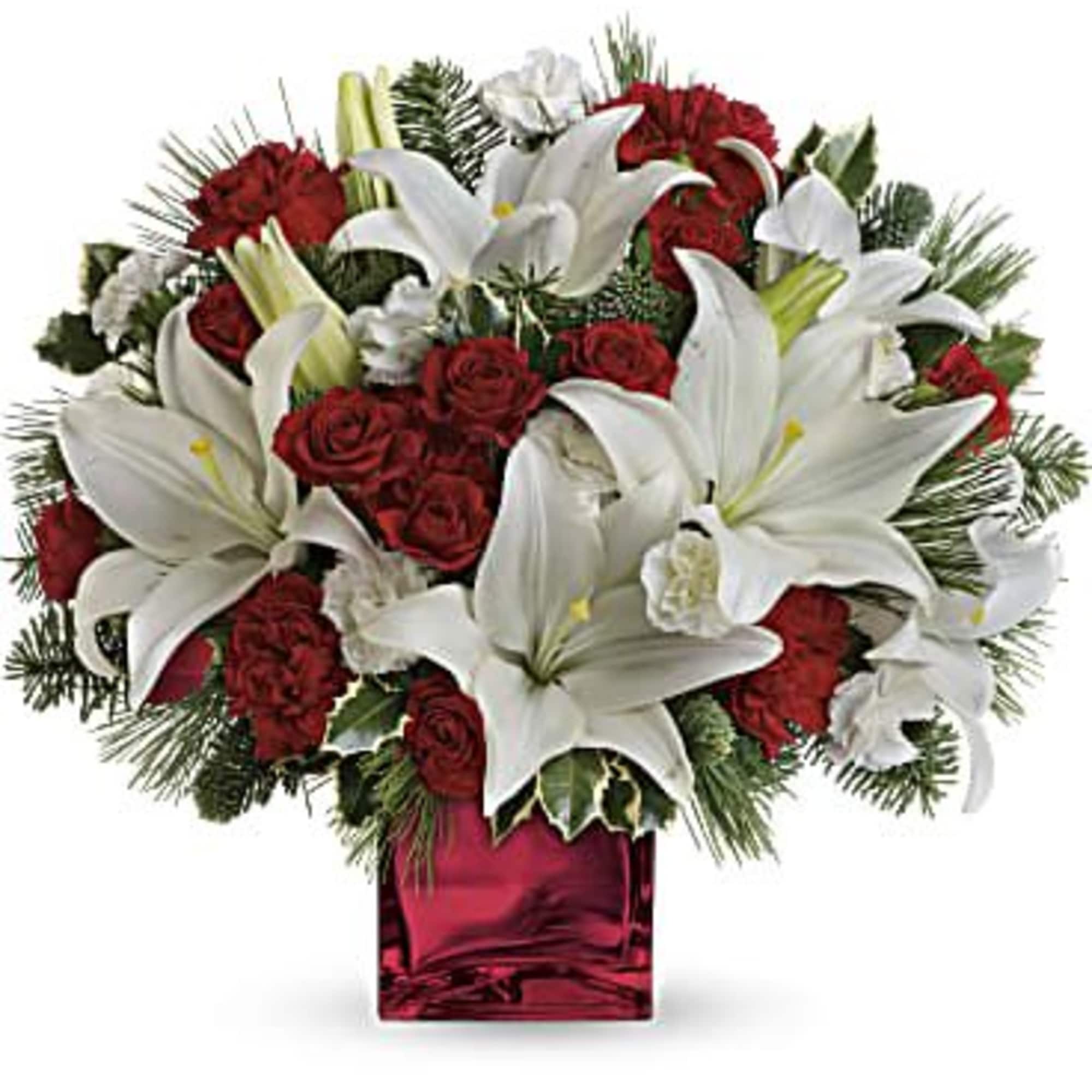 Filled with holiday charm. Red spray roses and white asiatic lilies are