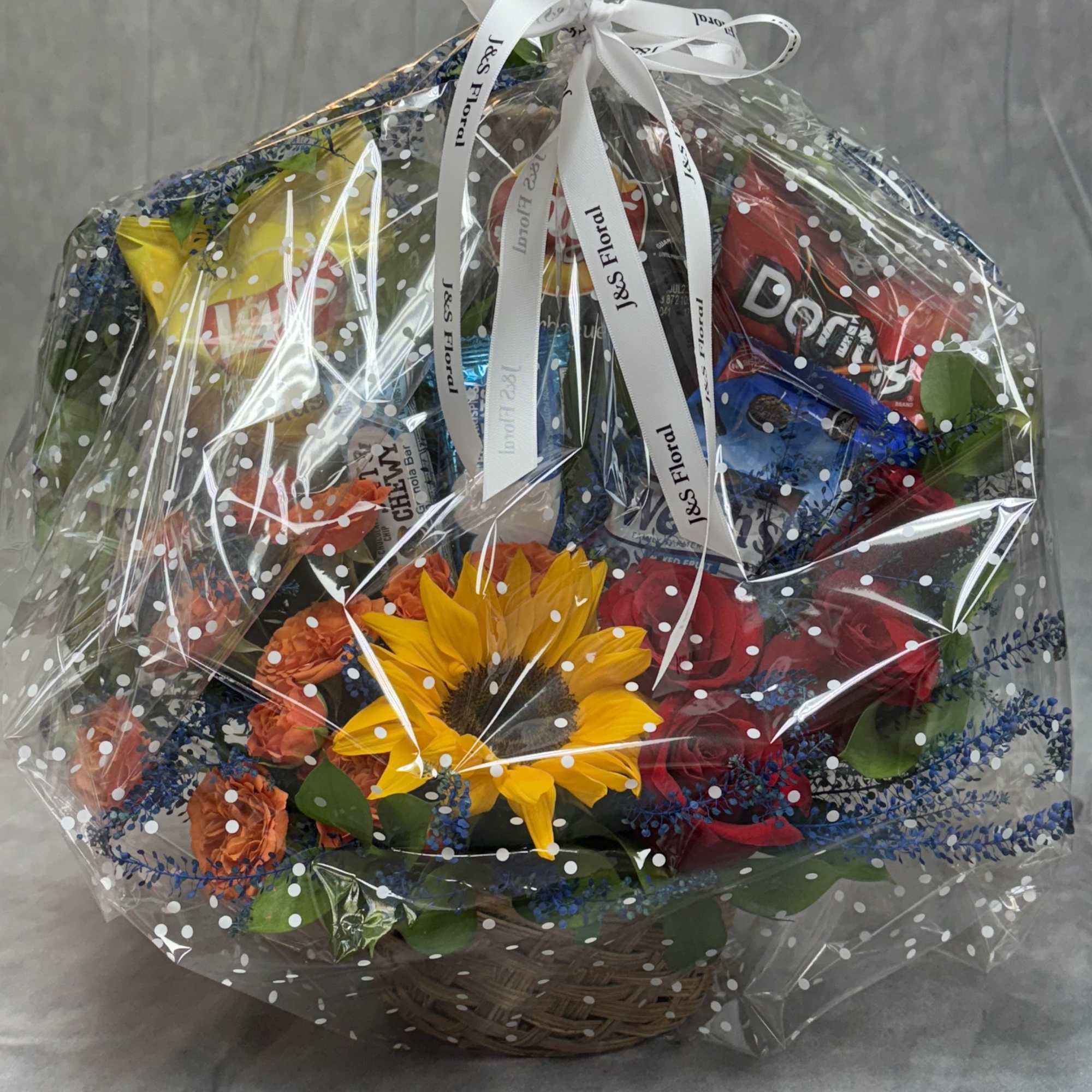 Flowers for the heart, snacks for the soul. This basket is a