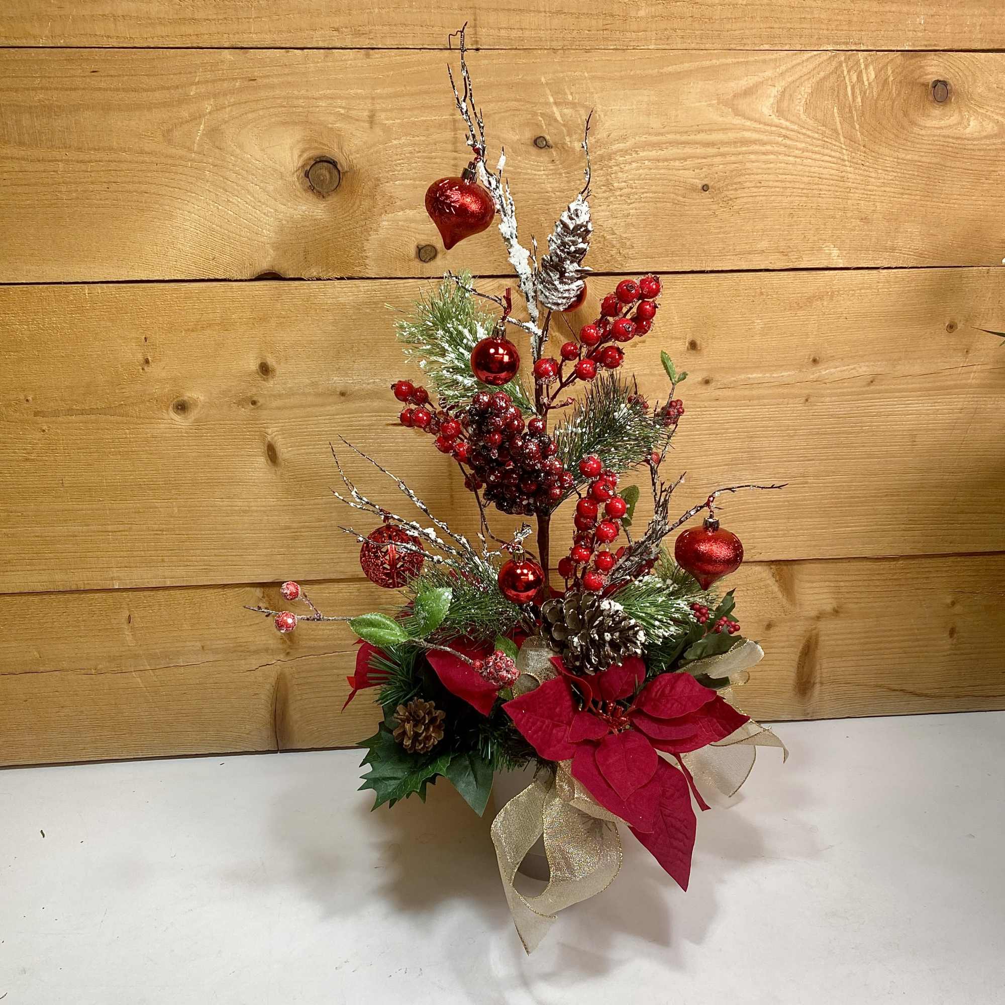 Our Scarlet Symphony Silk Arrangement is a beautiful artificial holiday arrangement that