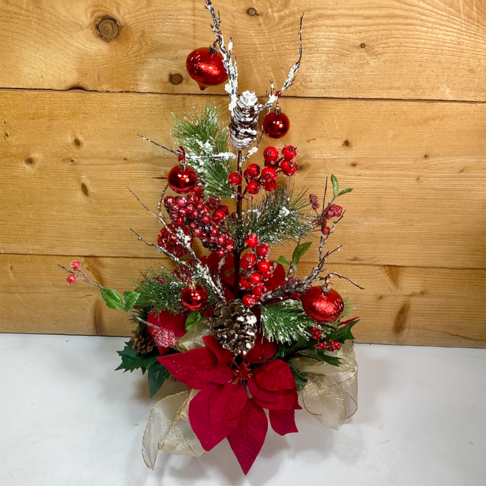 Our Scarlet Symphony Silk Arrangement is a beautiful artificial holiday arrangement that