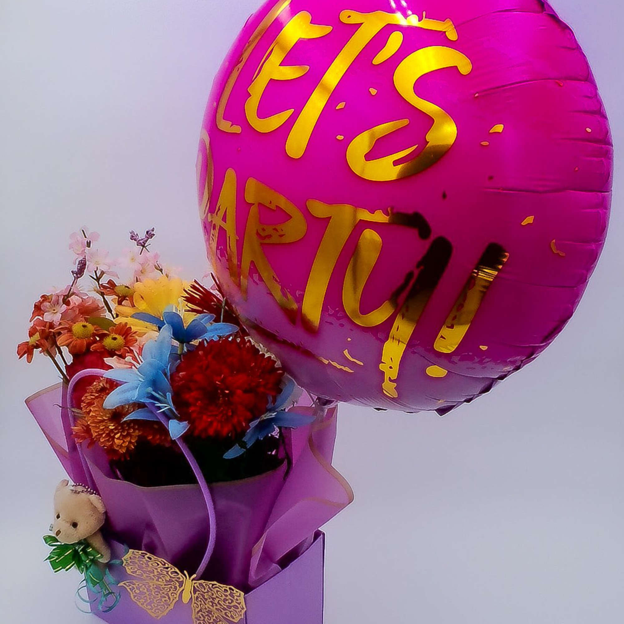 Mixed Fresh Flowers (14&ndash;16 stems): a colorful blend of 8 carnations, 2