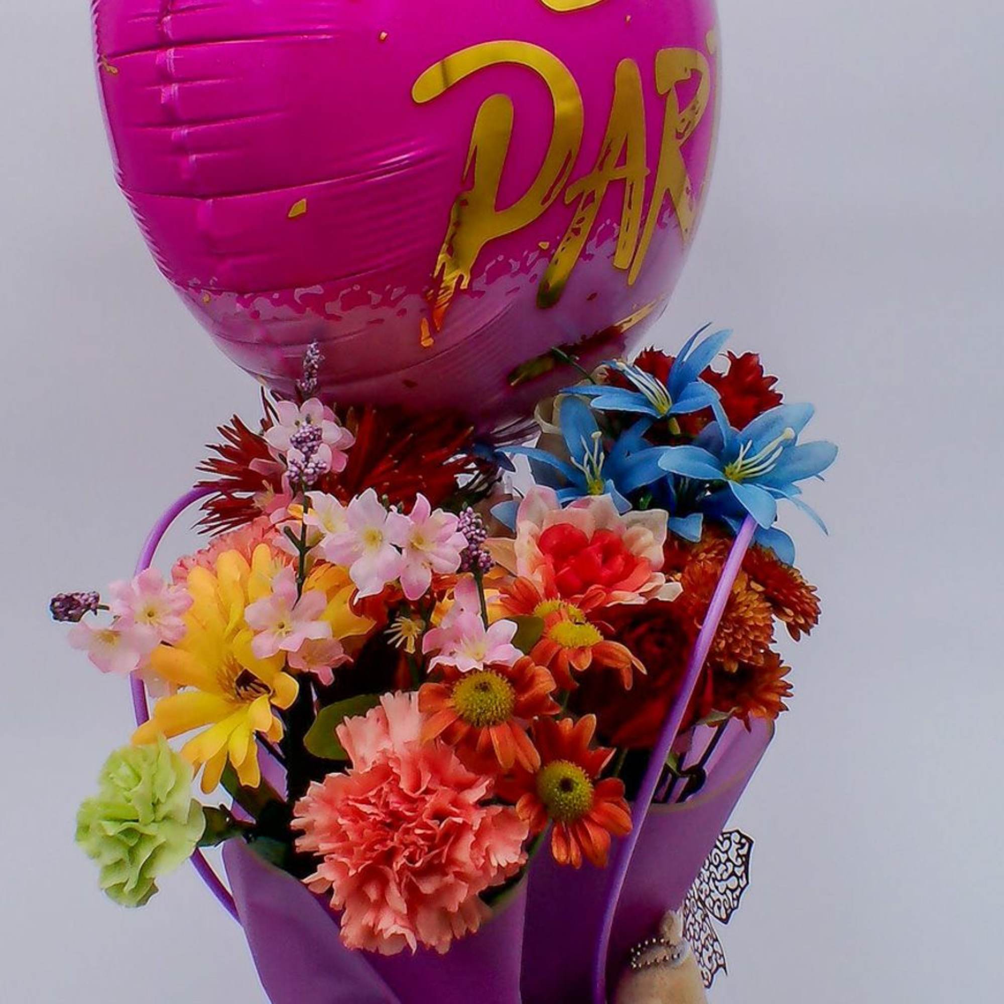 Mixed Fresh Flowers (14&ndash;16 stems): a colorful blend of 8 carnations, 2