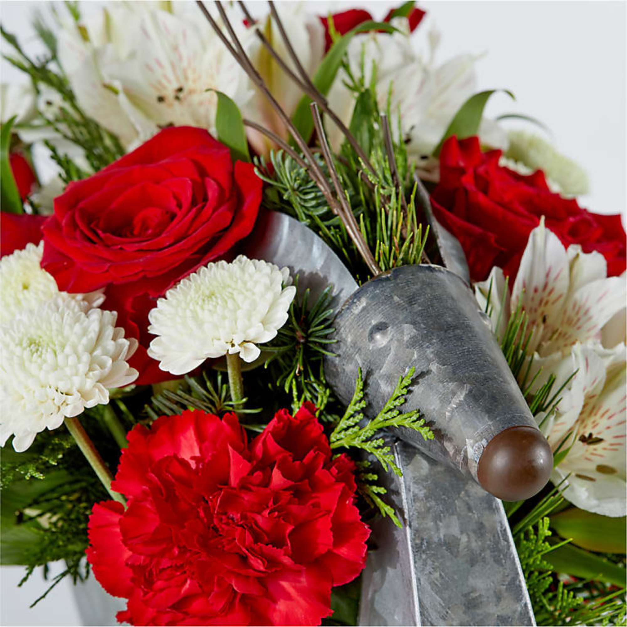 Fly into Christmas Eve with this dashing Prancer Bouquet designed in a