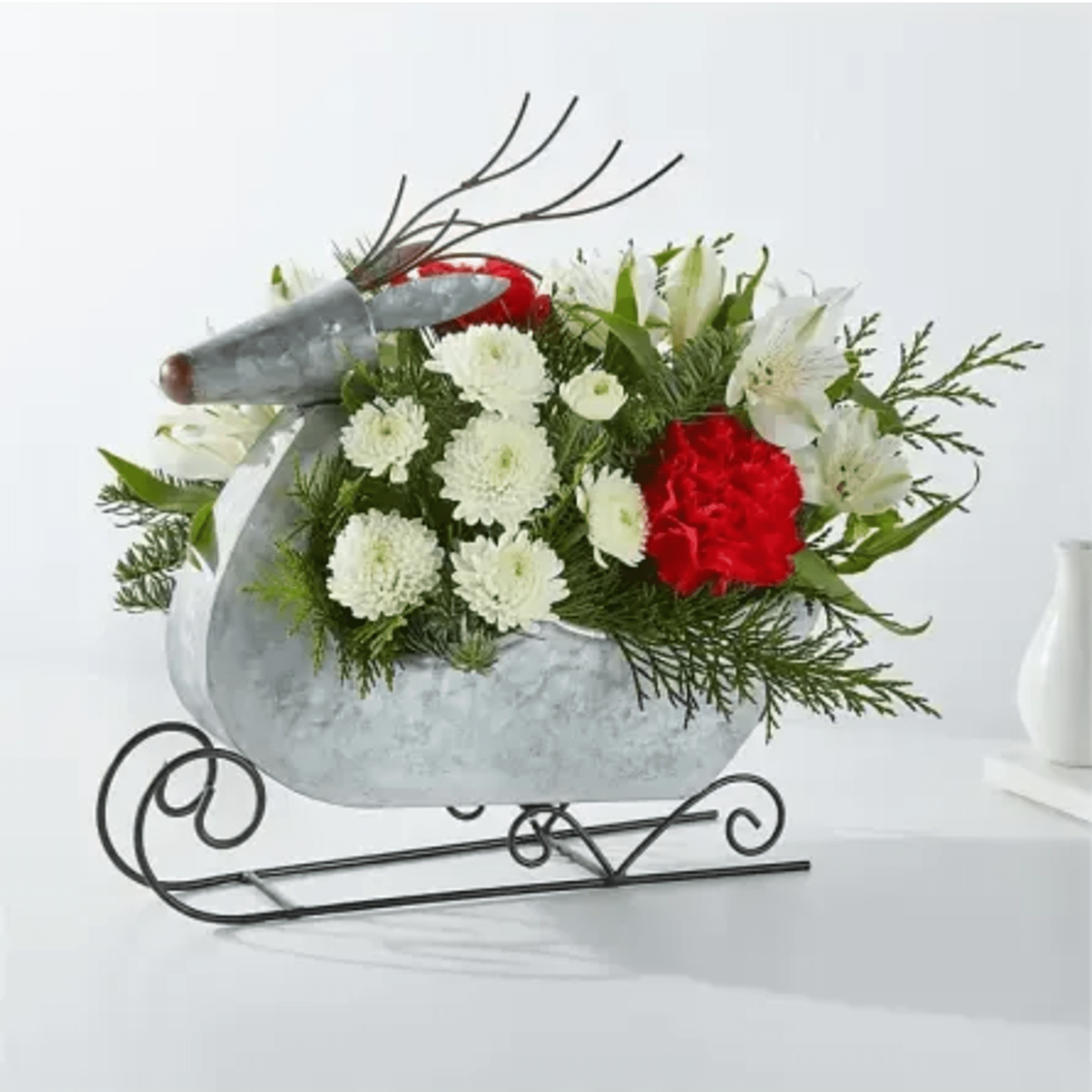 Fly into Christmas Eve with this dashing Prancer Bouquet designed in a