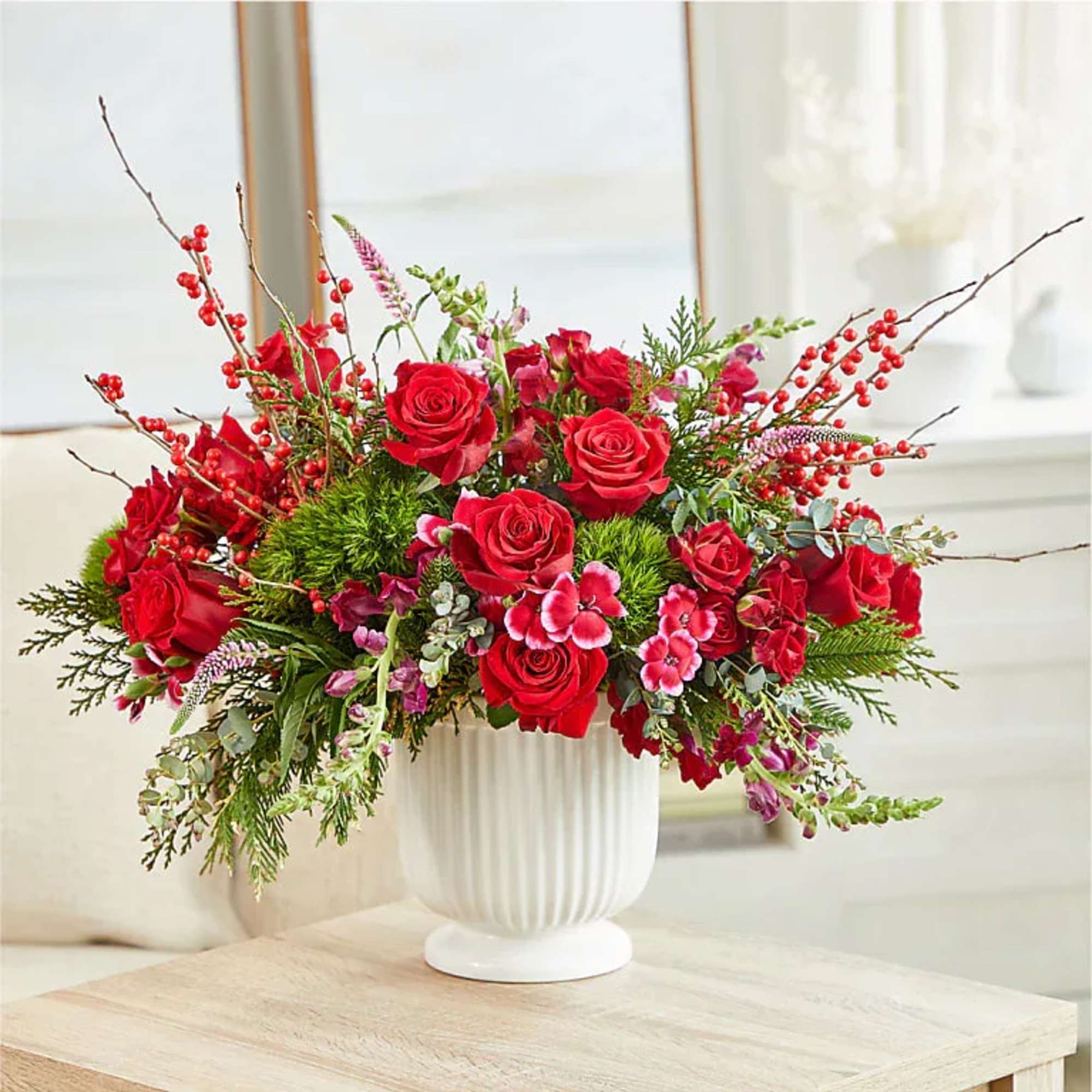Make a statement this holiday season with the Big Red Bow Bouquet