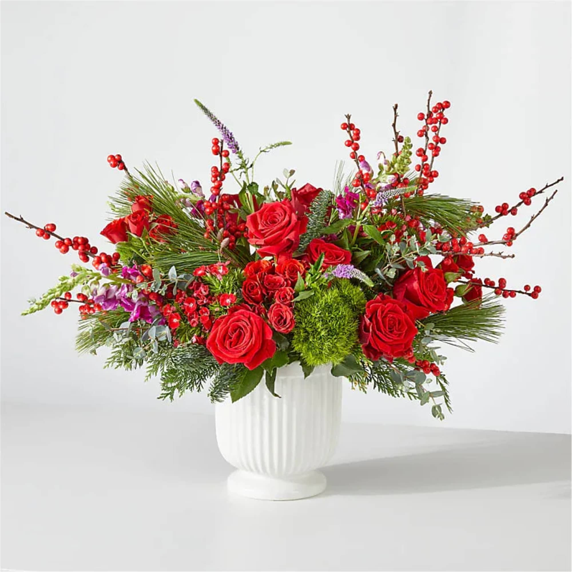 Make a statement this holiday season with the Big Red Bow Bouquet