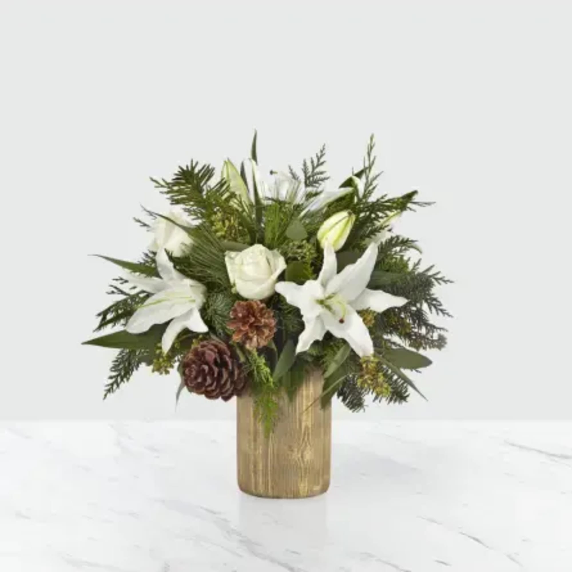 The Joyous Greetings Bouquet is an elegant collection of ivory, cream, and
