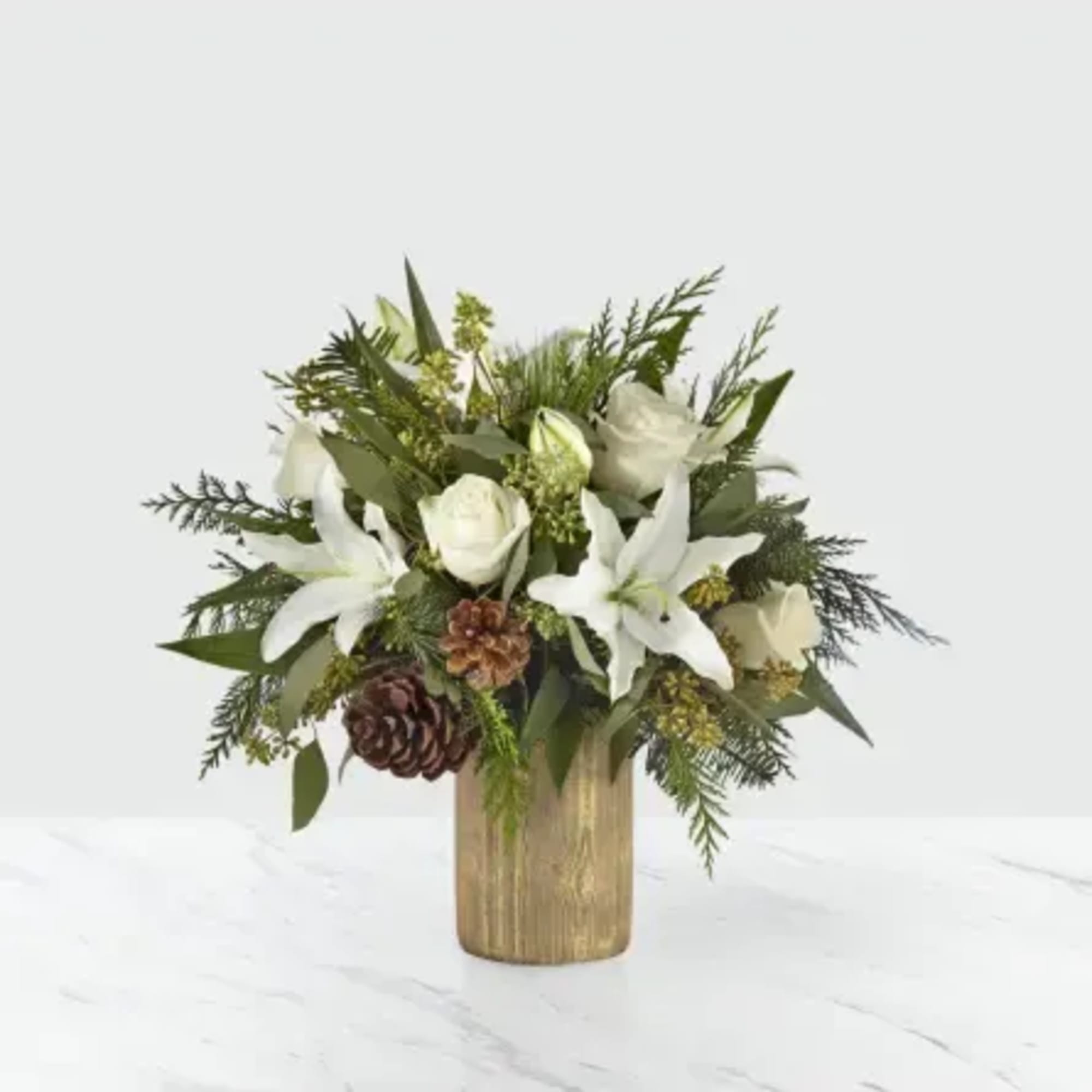 The Joyous Greetings Bouquet is an elegant collection of ivory, cream, and