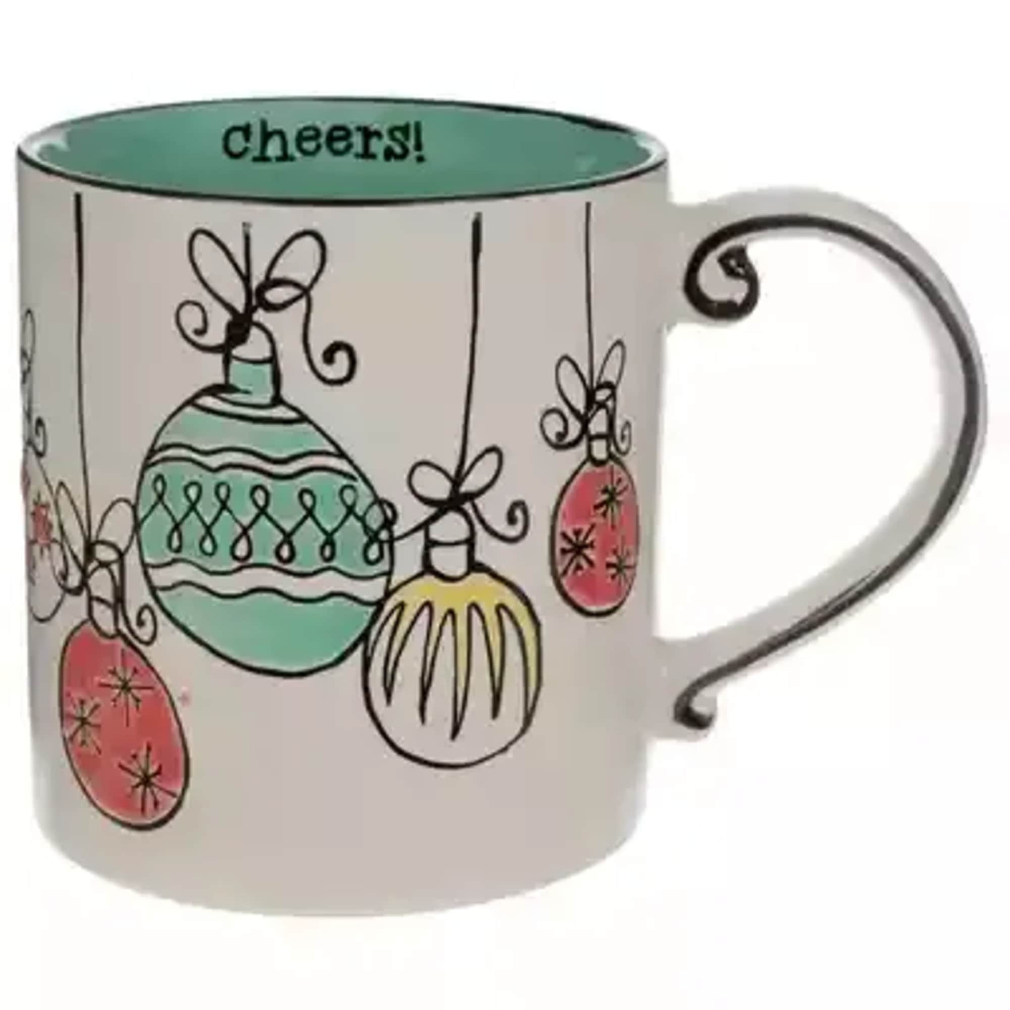 A holiday themed mug filled with seasonal cheer! Mixed seasonal foliage and