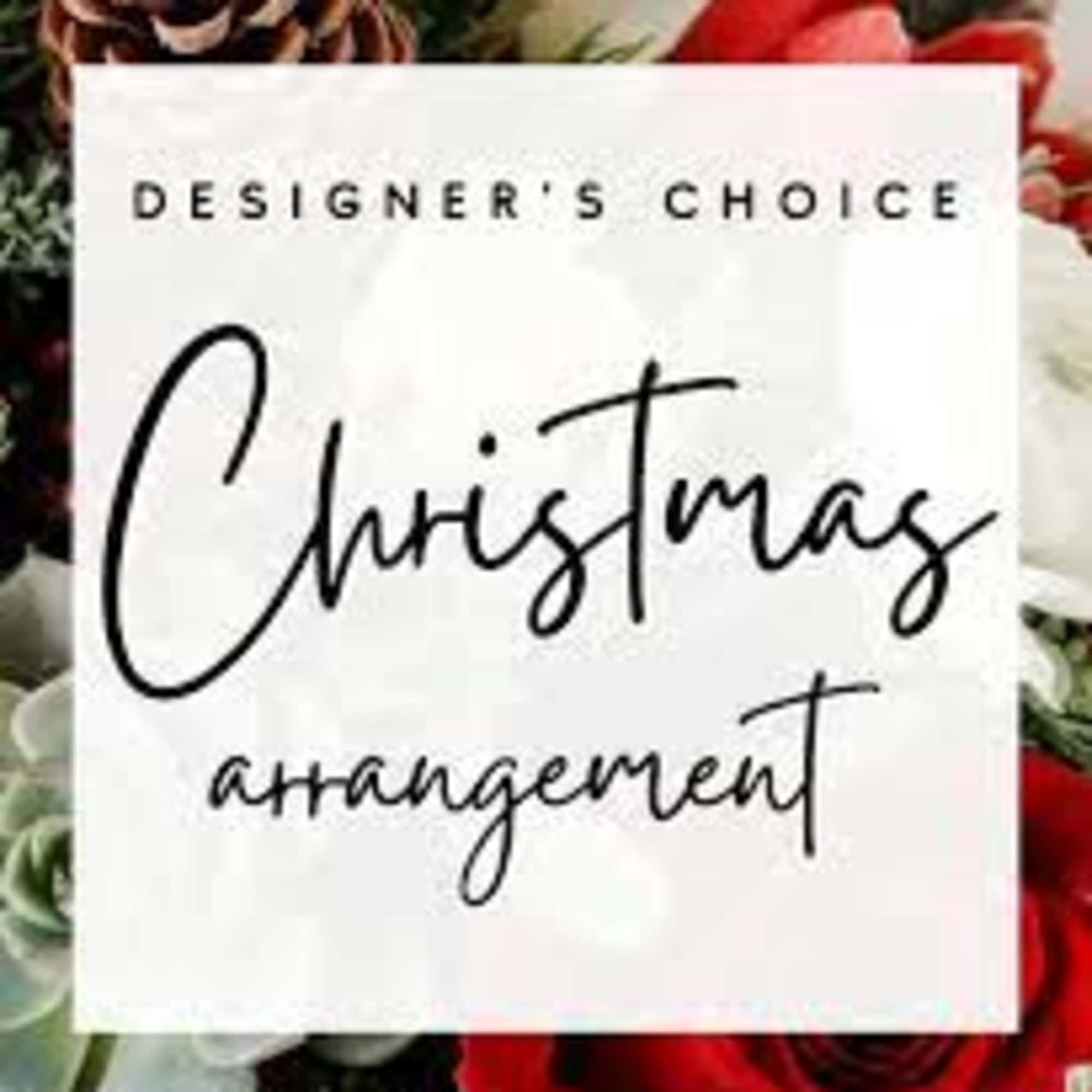 Surprise them with a stunning hand-designed seasonal arrangement full of fresh Christmas