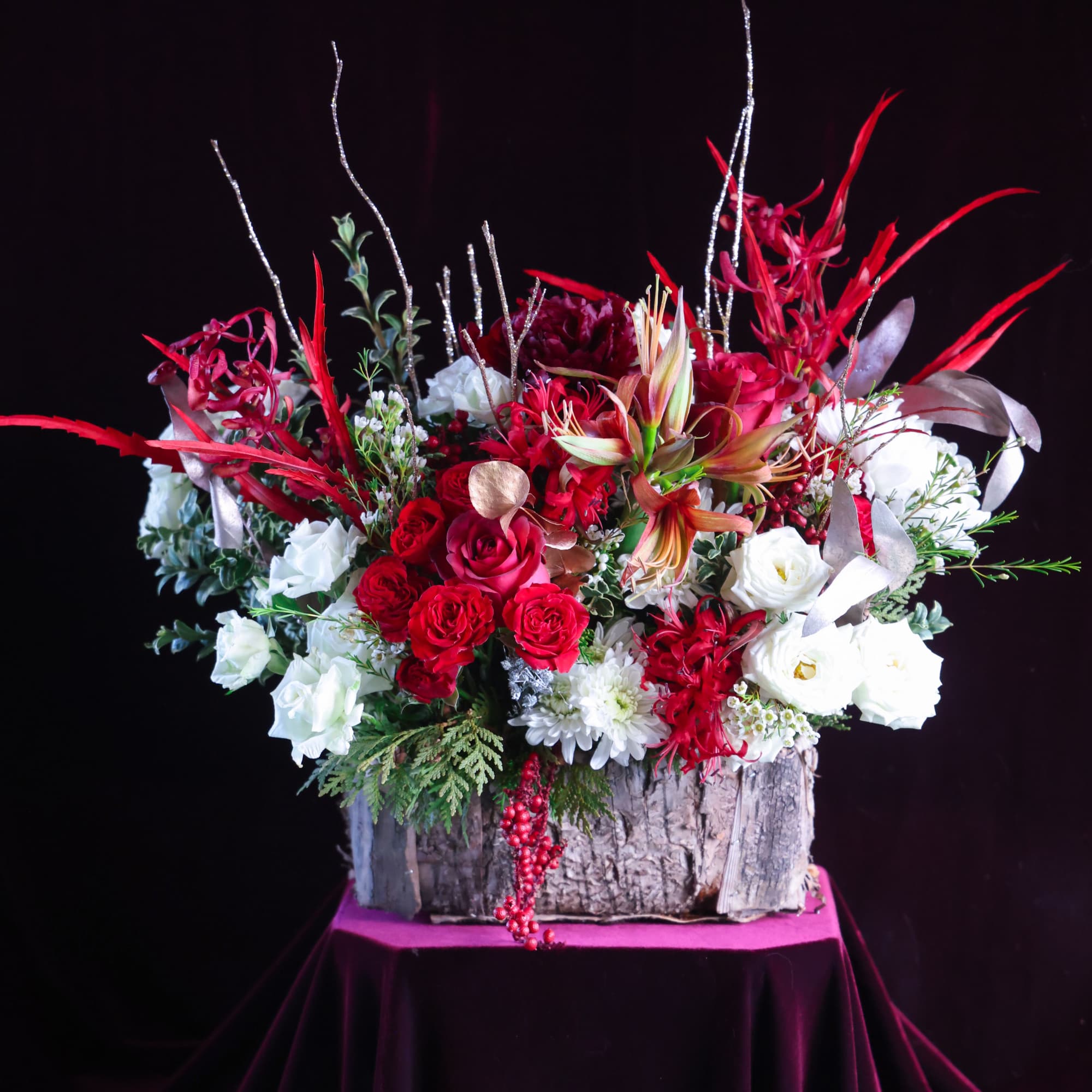 Custom, one of a kind floral arrangements by floral artist Stacy Leafsong.

Arrangement