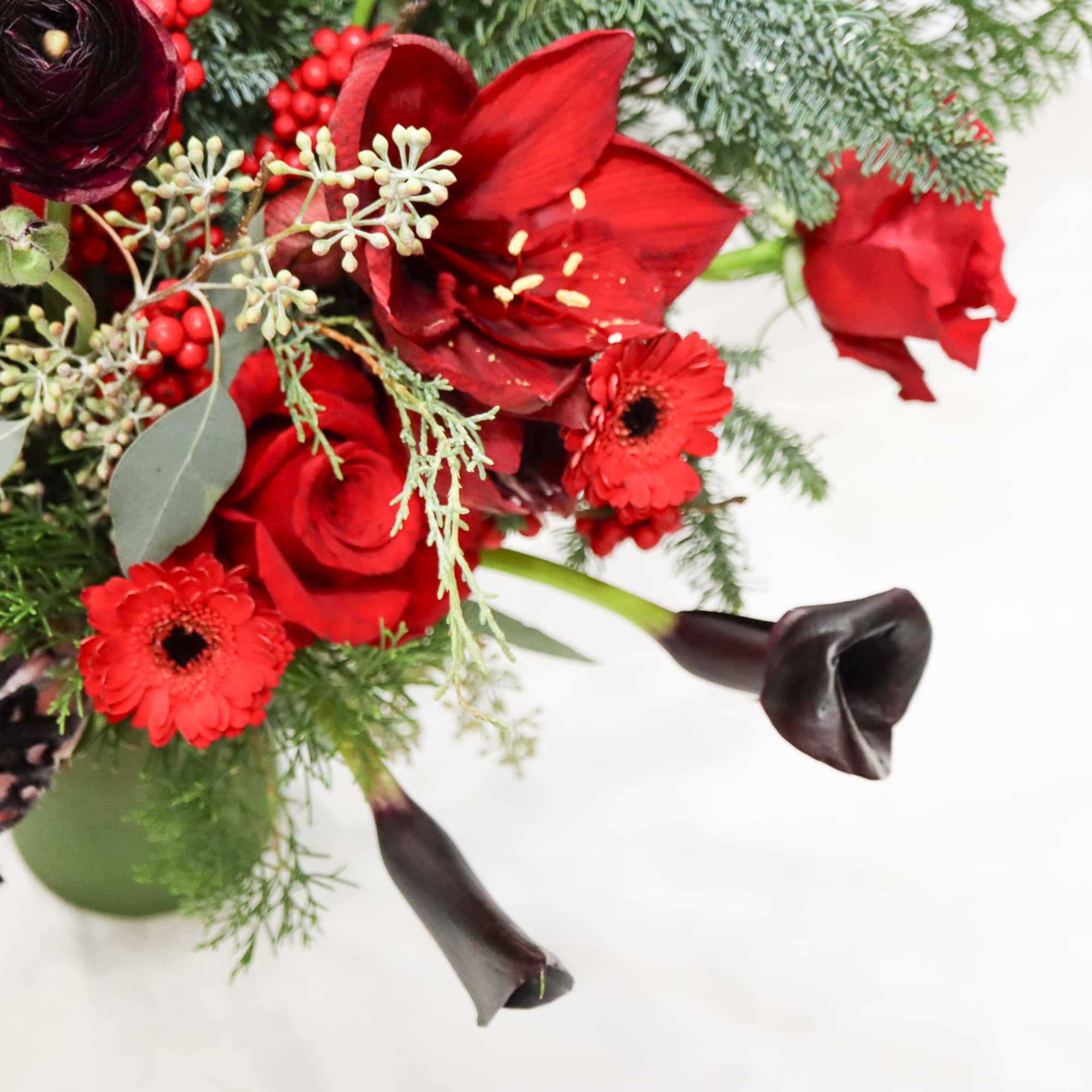 Winterberry is one of our newest arrangement in our Holiday Collection. Comes