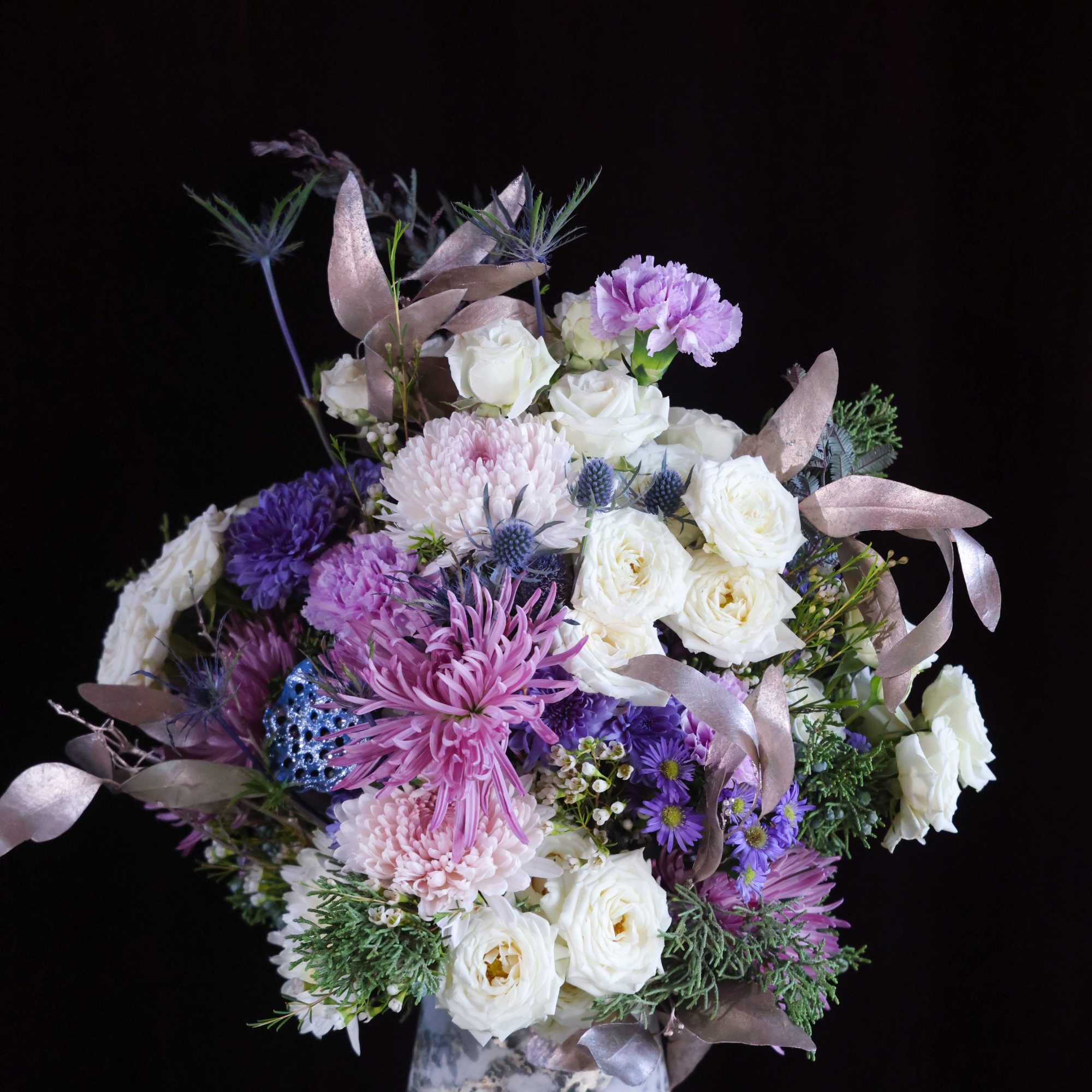 Custom, one of a kind floral arrangements by floral artist Stacy Leafsong.

Arrangement