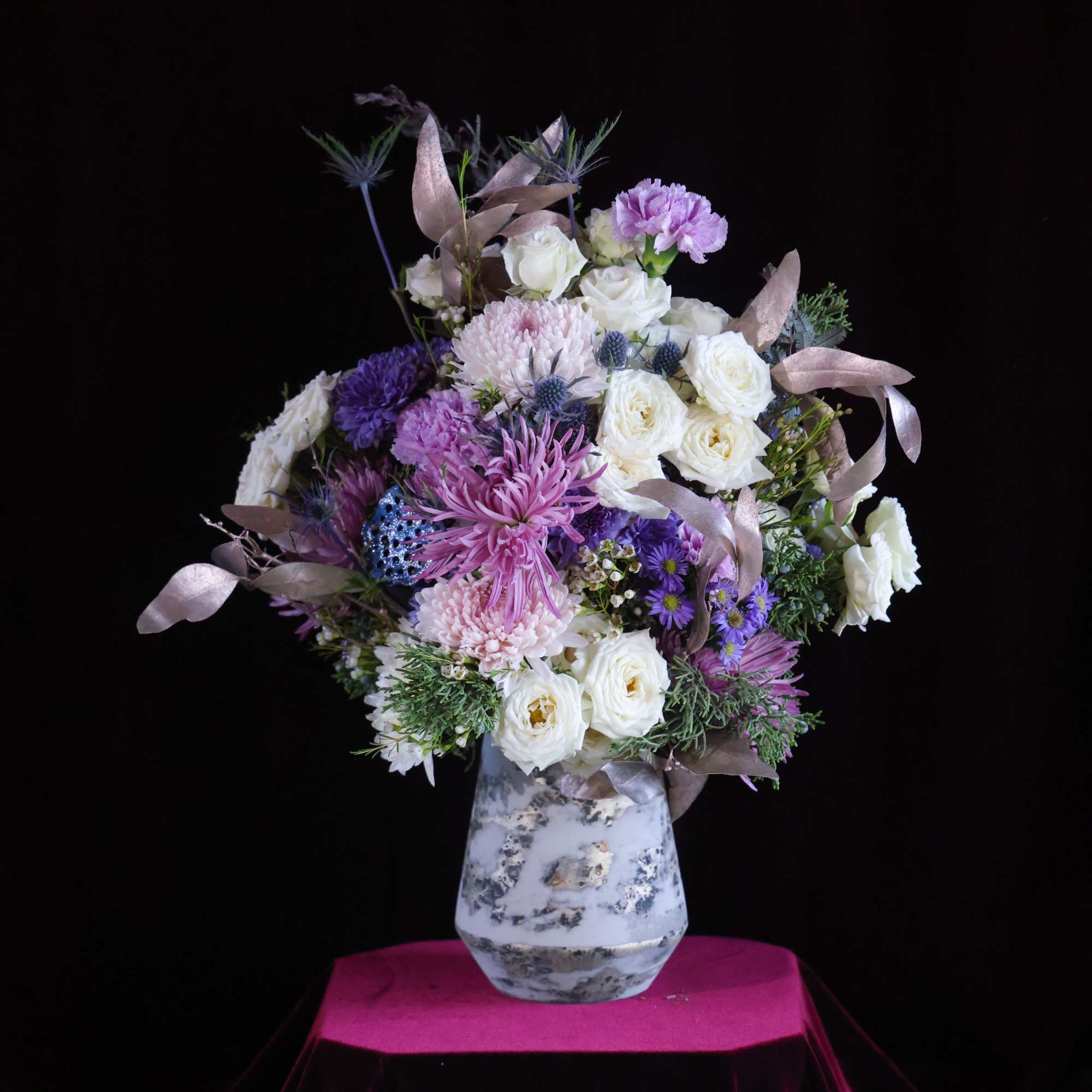 Custom, one of a kind floral arrangements by floral artist Stacy Leafsong.

Arrangement