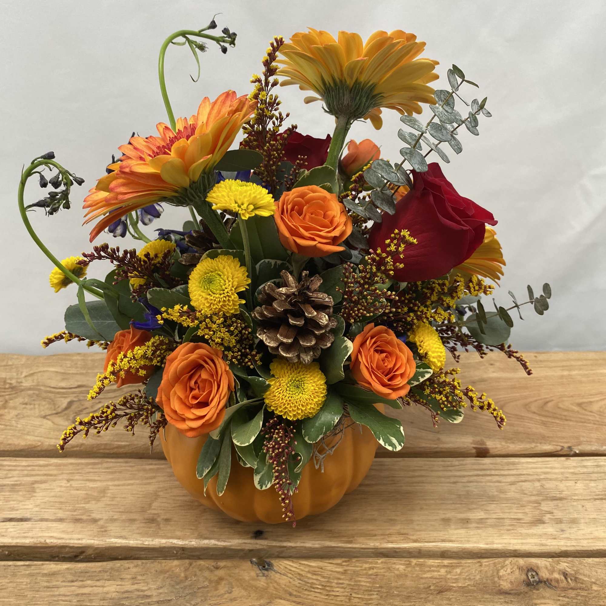 A ceramic pumpkin full of fall colors will be great as a