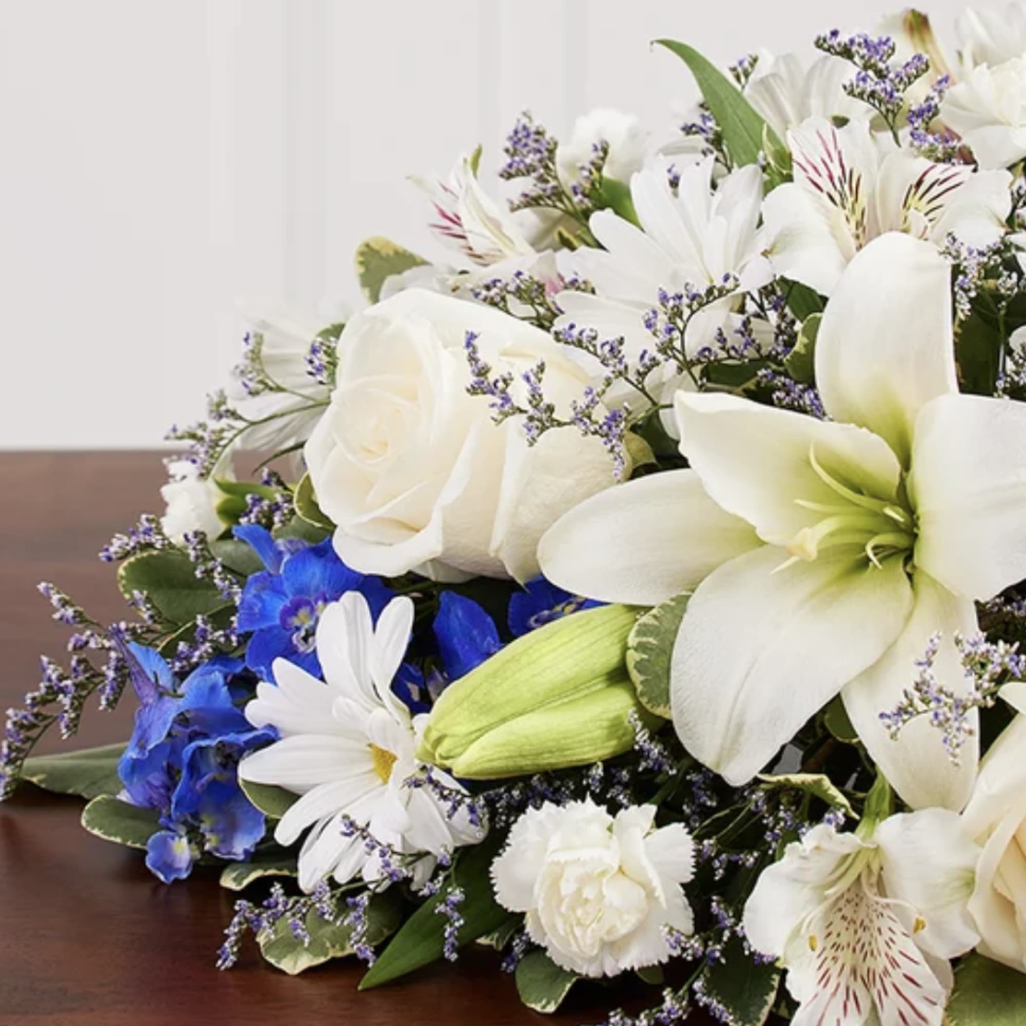 Graceful, calming, and beautifully composed, this arrangement brings a sense of peace